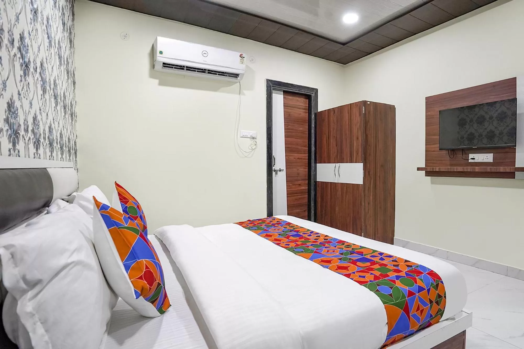 Bed in FabHotel Rajdhani