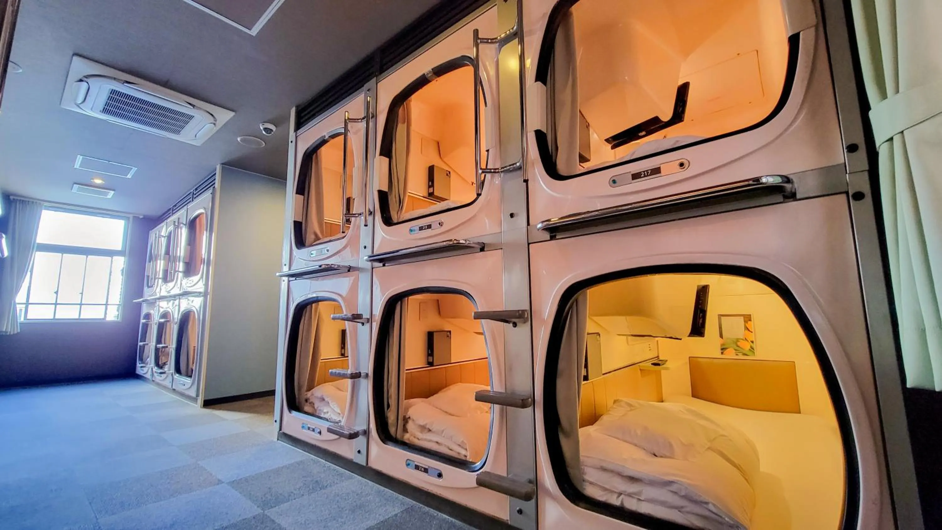 Bed in Hotel Palms Tenmonkan