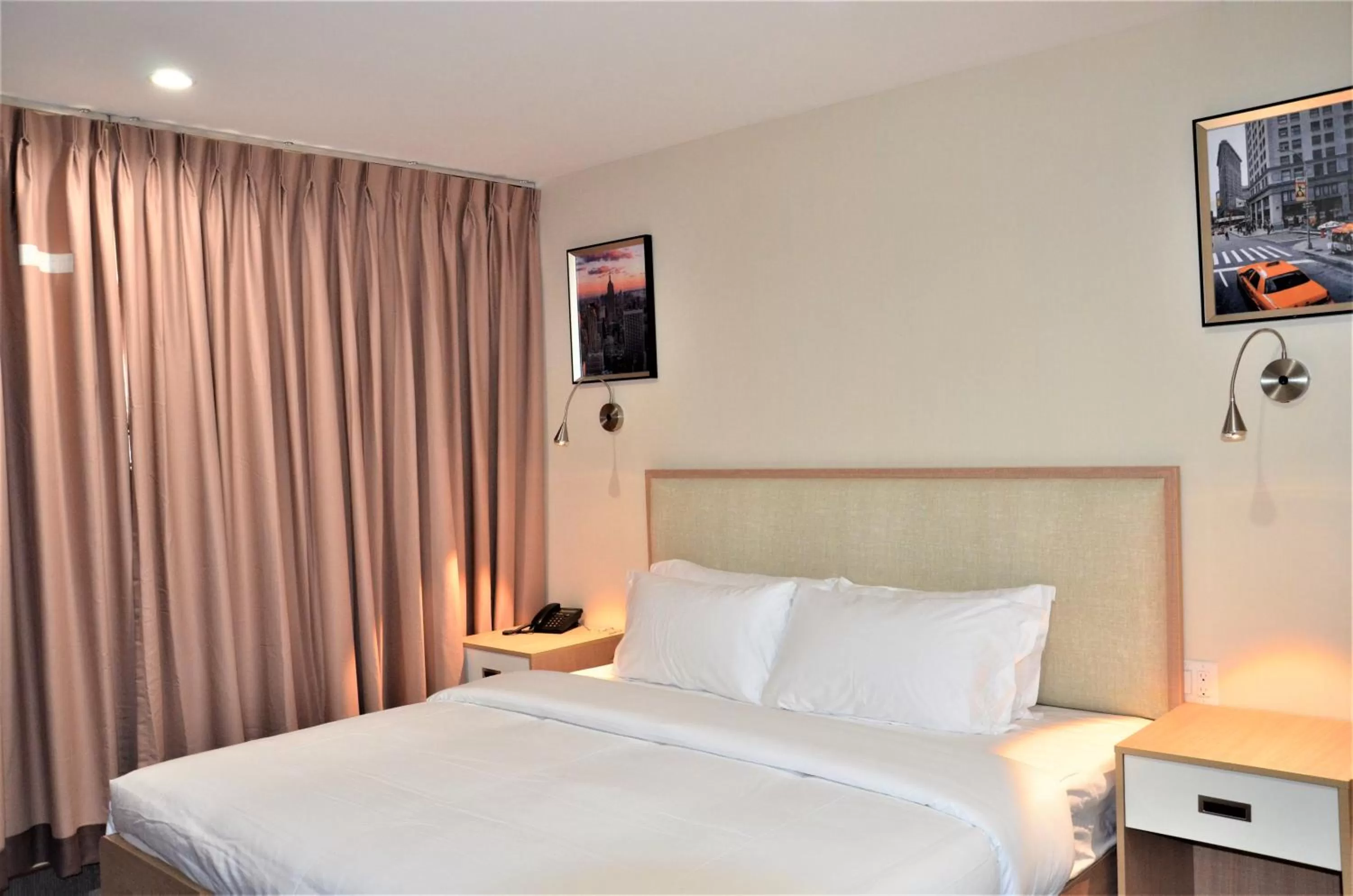 Bed in LIC Plaza Hotel