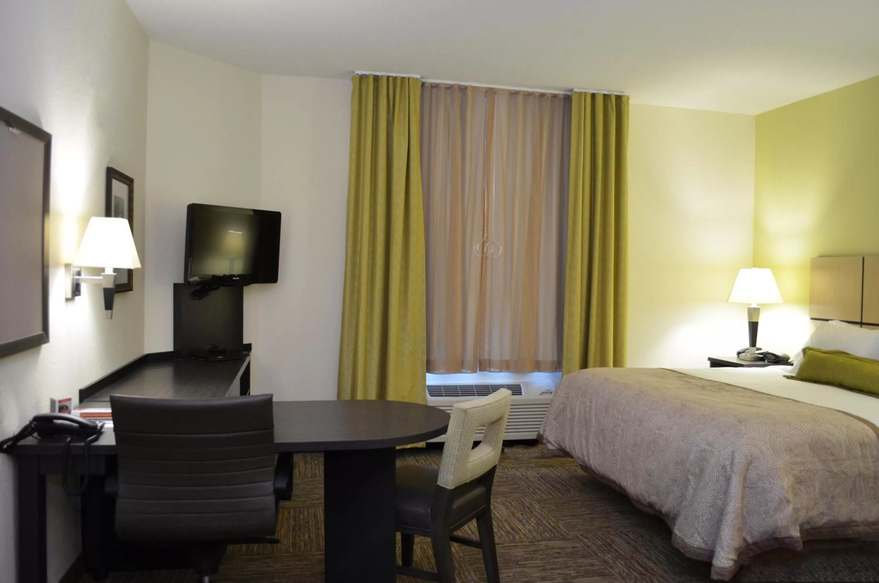 Photo of the whole room, Bed in Candlewood Suites Greenville by IHG