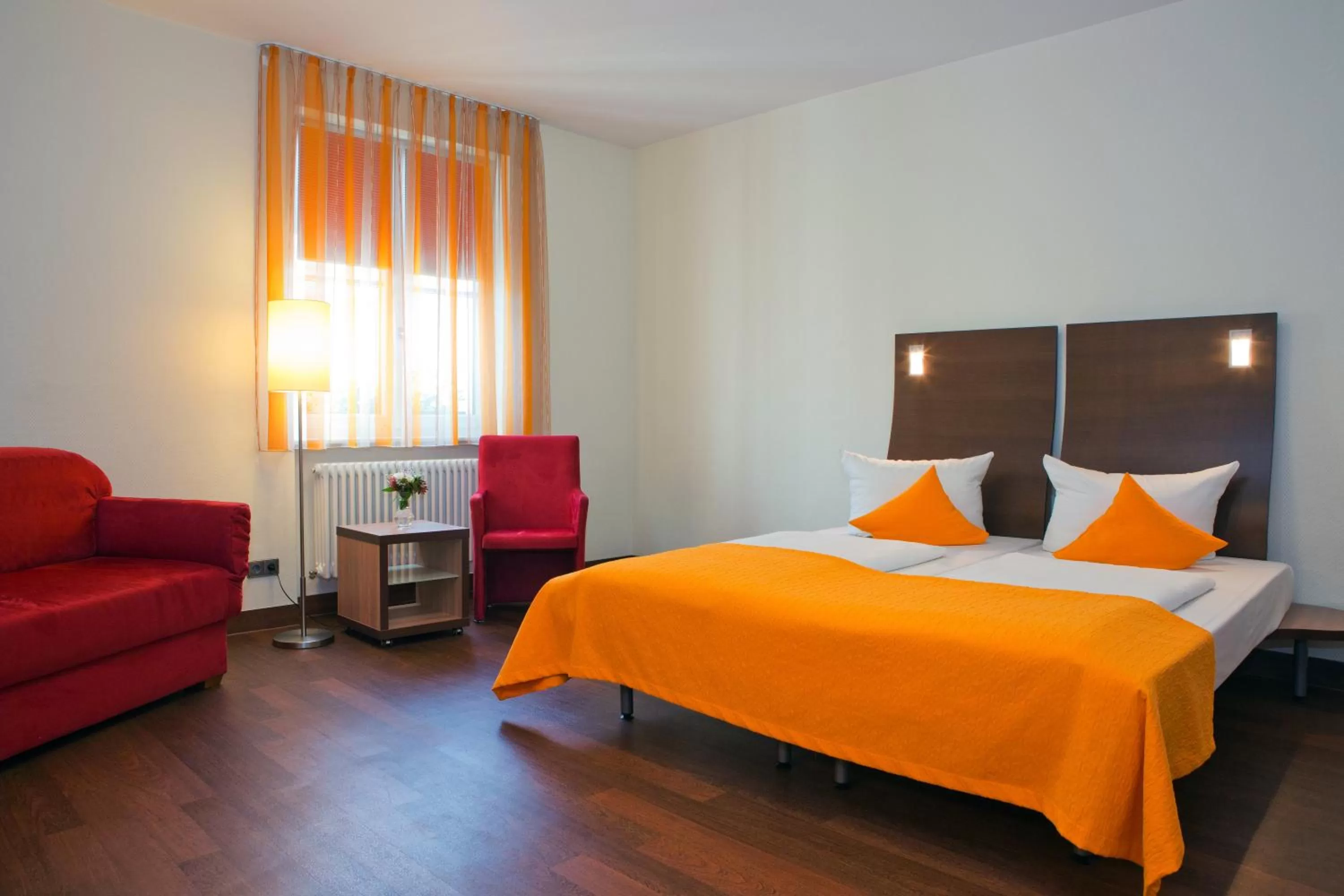 Photo of the whole room, Bed in Stadthotel Freiburg Kolping Hotels & Resorts