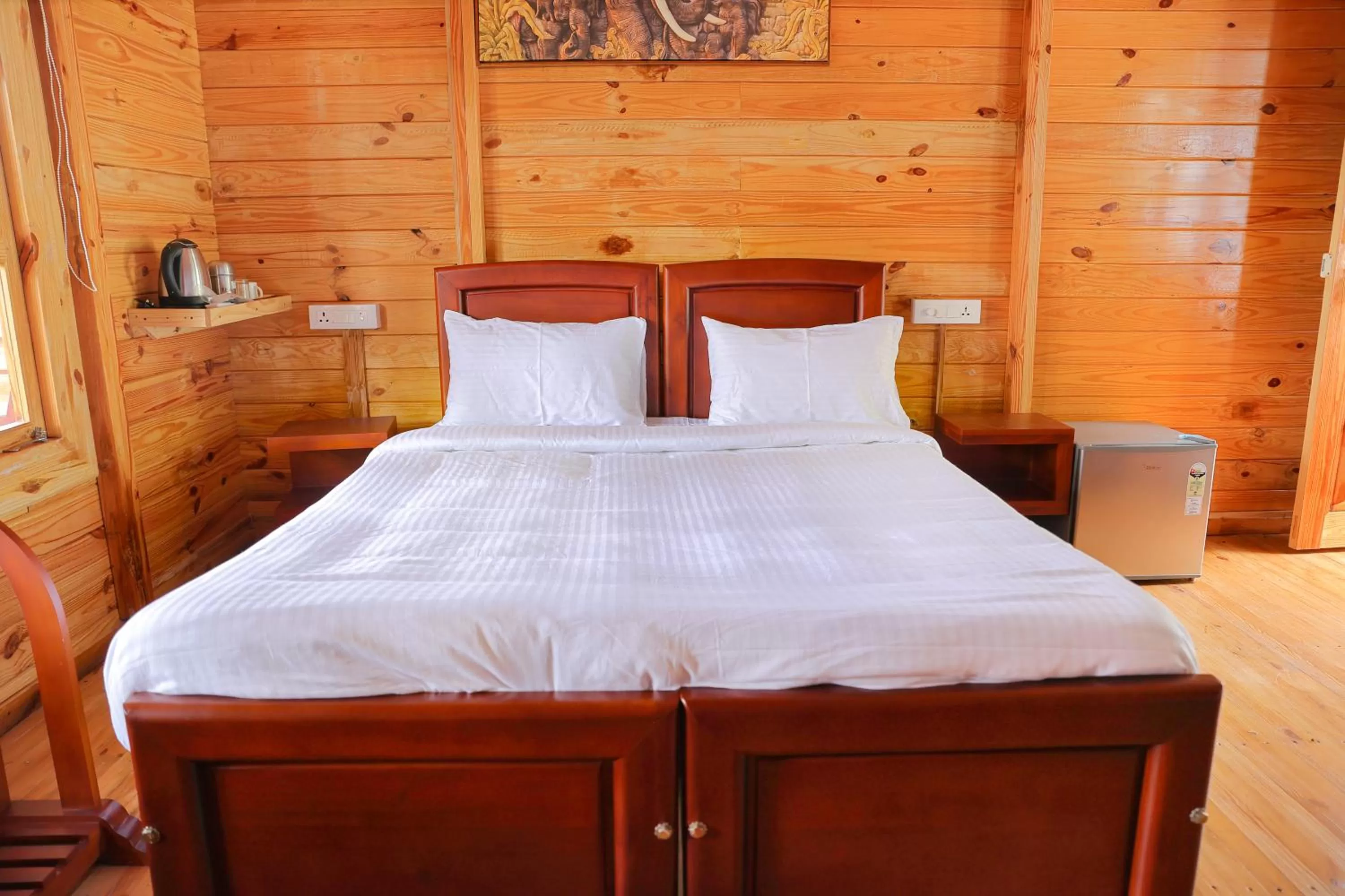 Bed in Woodrose Resort