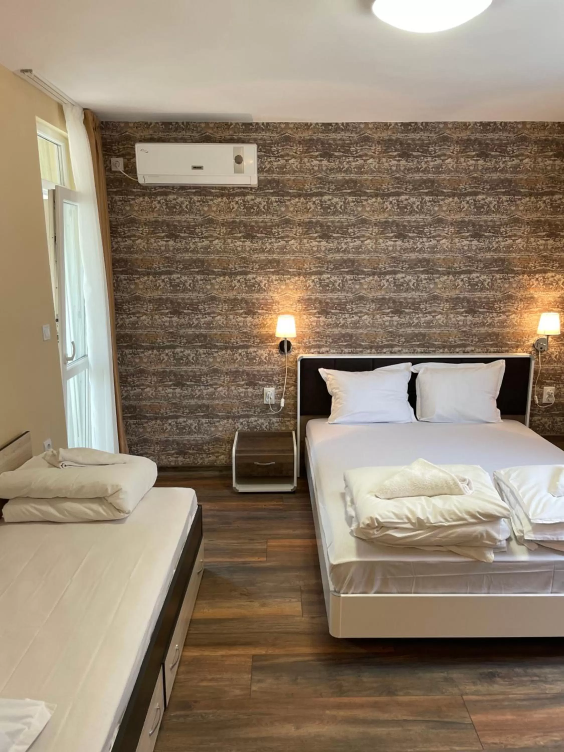 Bed in Family Hotel Malibu