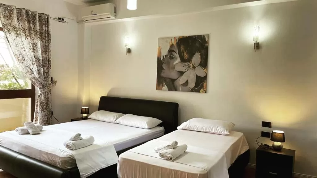 Bed in Hotel Ambasador