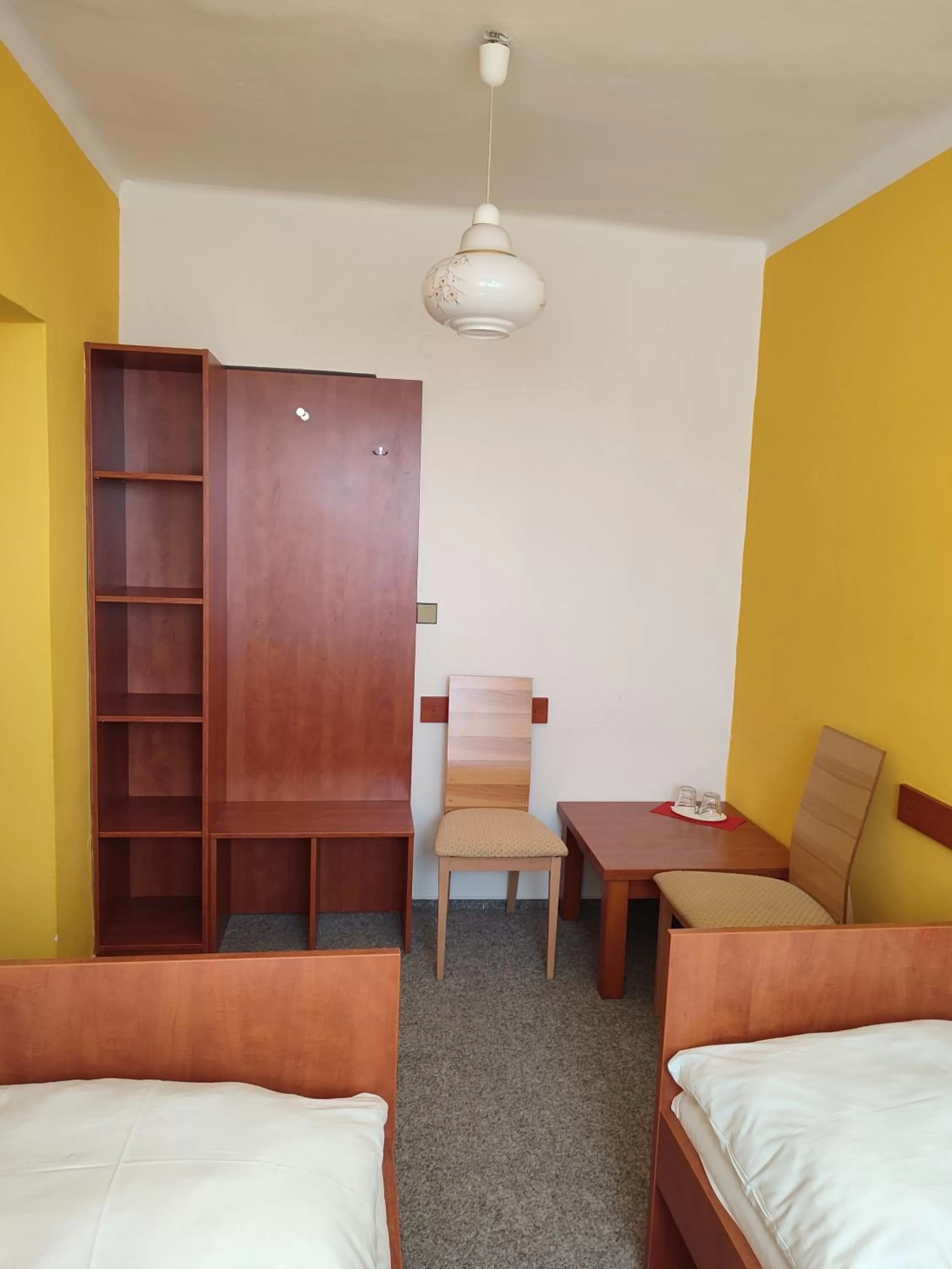 Bed in BEST Hotel Garni