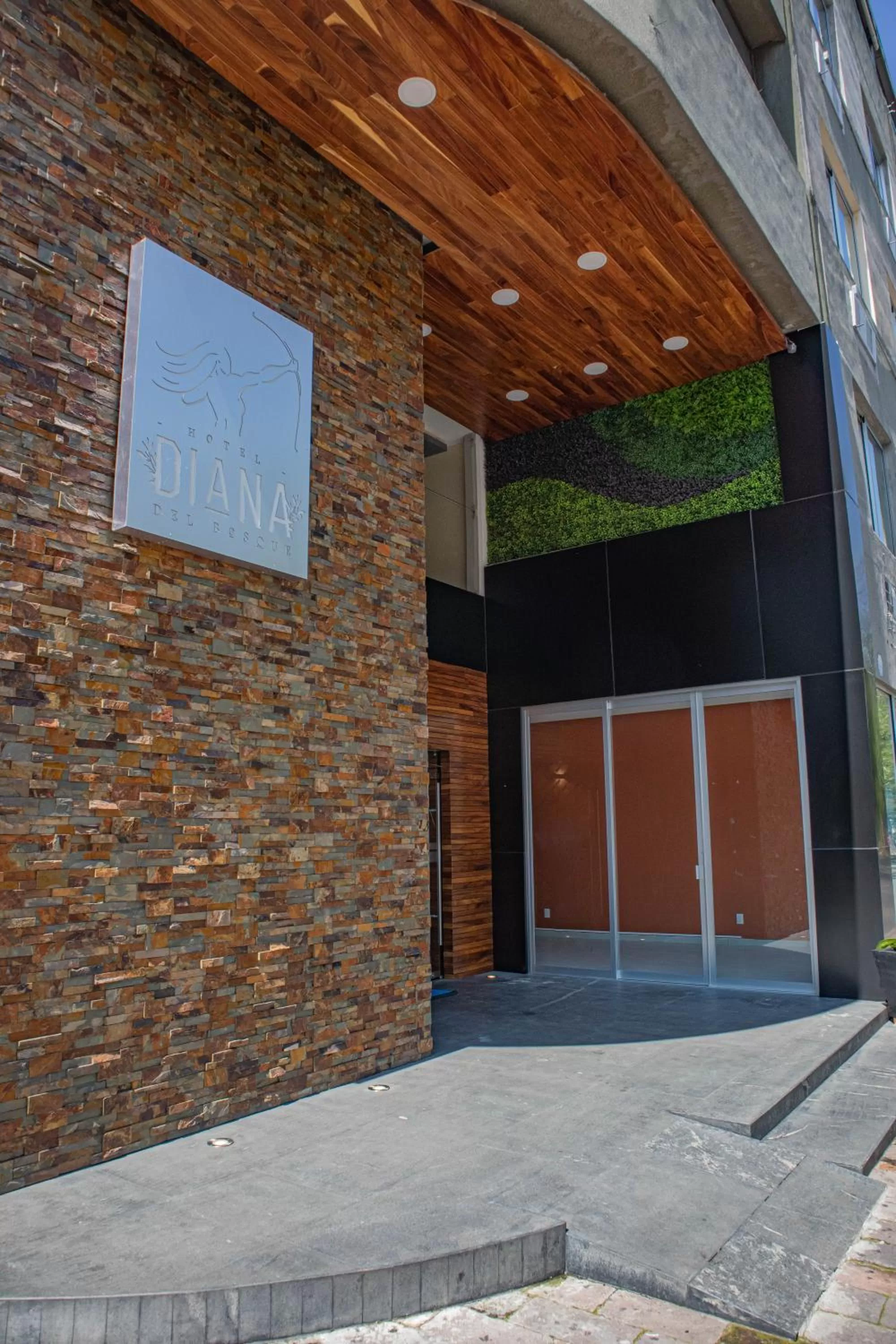 Property building in Hotel Diana del Bosque by DOT Urban