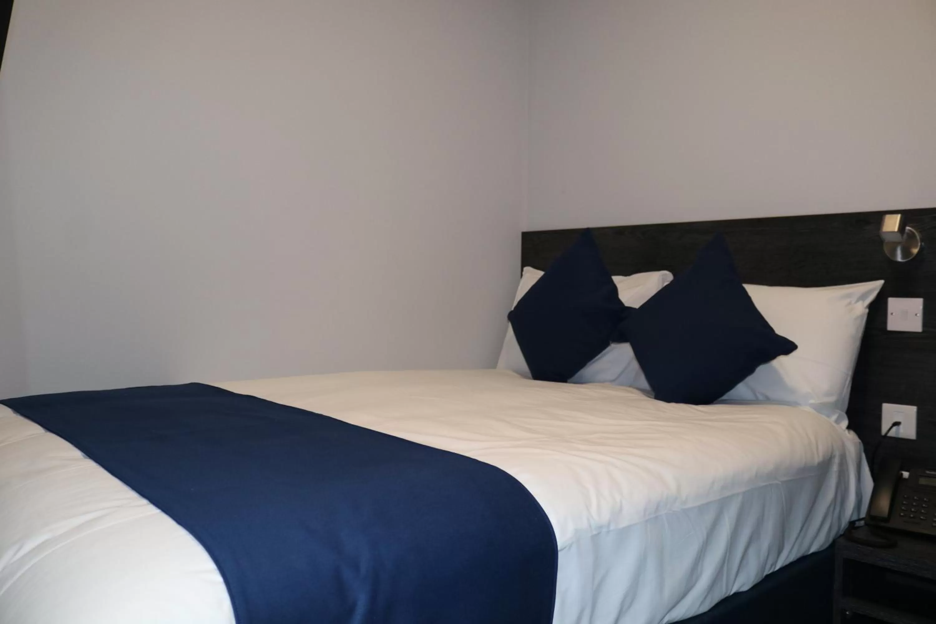 Bed in Blue Sapphire Hotel