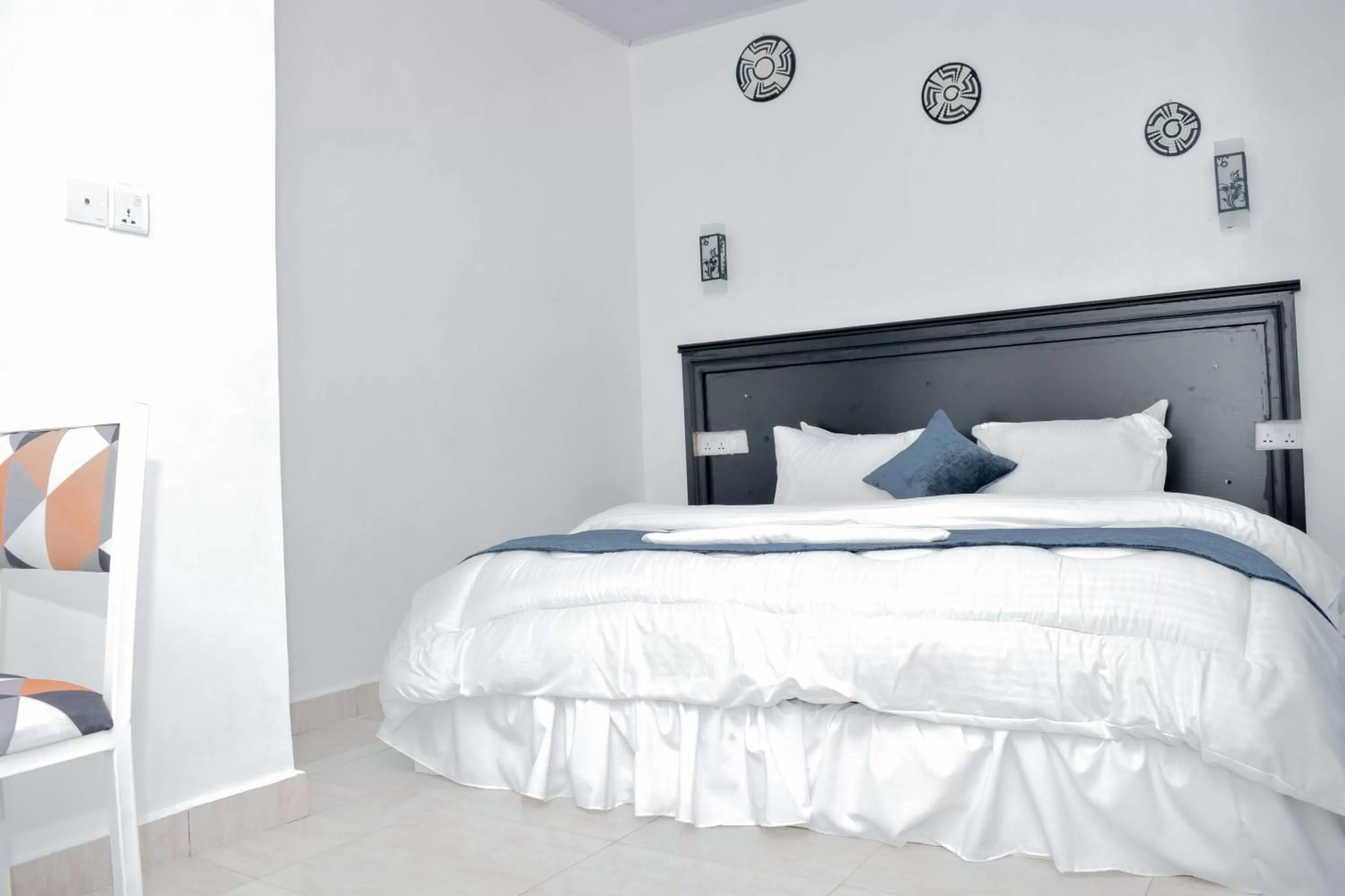 Bed in INZOZI AFRICA HOUSE B&B-Gishushu