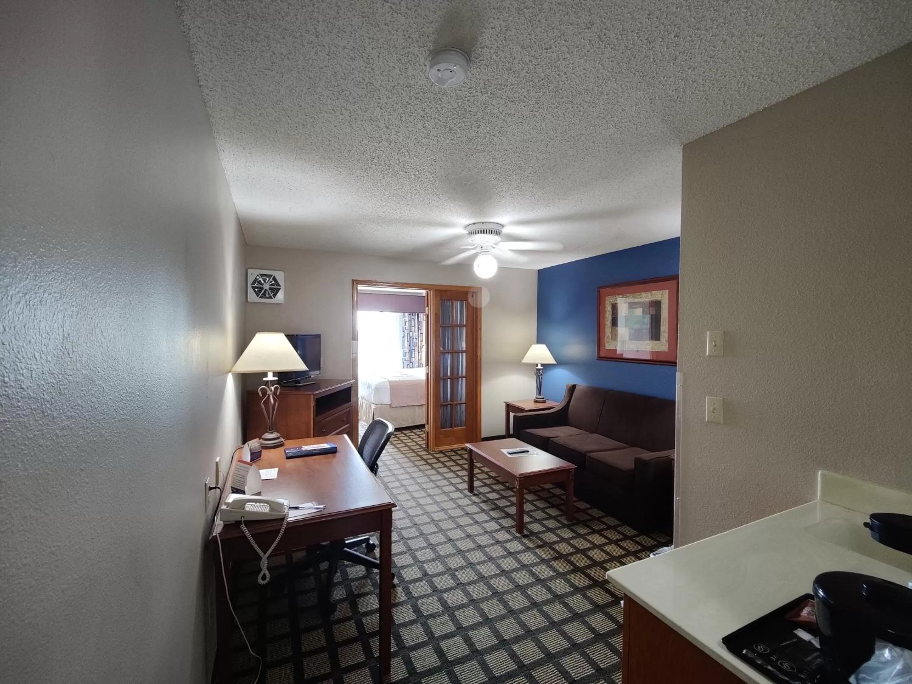 Living room, Bed in Baymont by Wyndham Albany MN