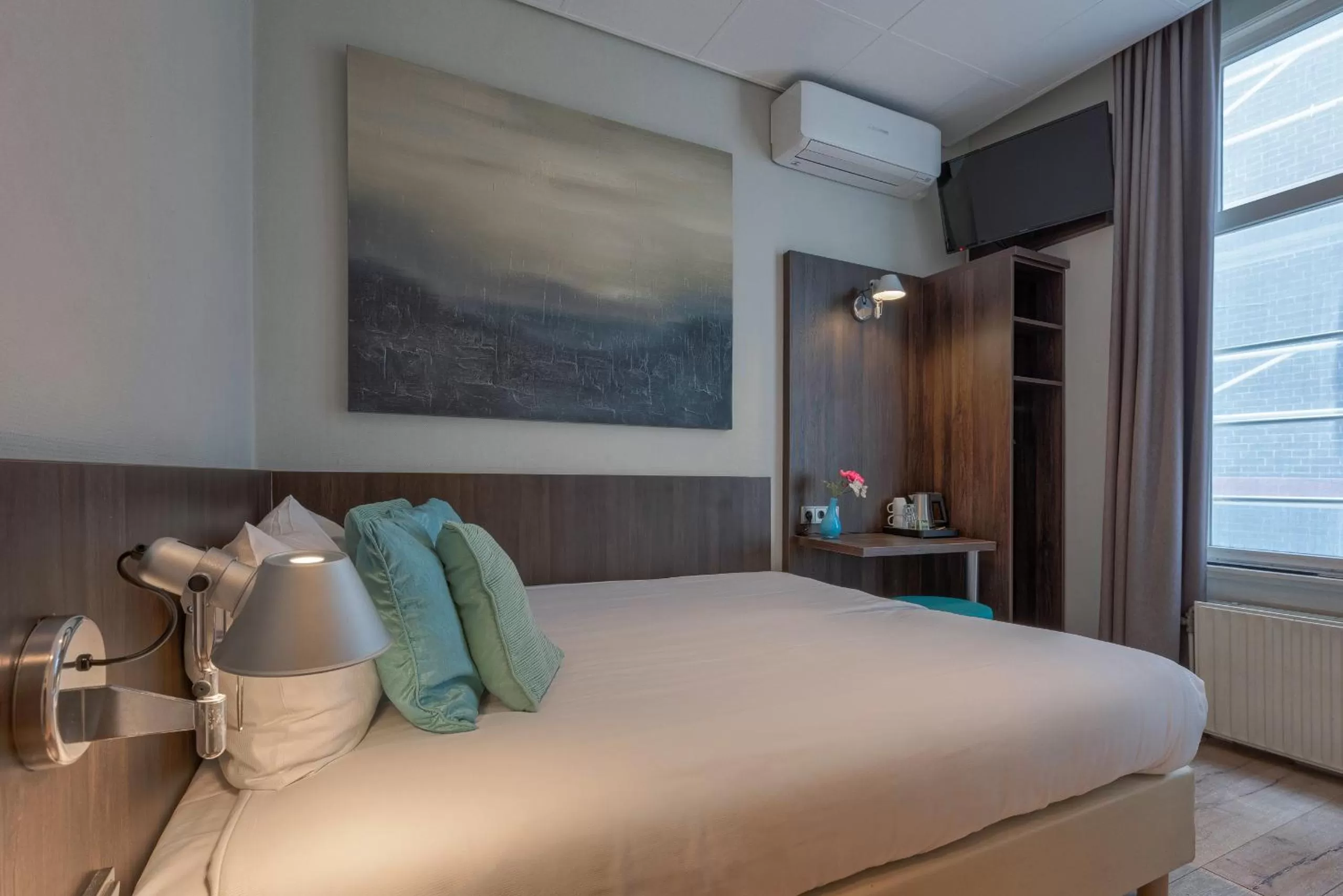 Bed in Hotel Damsquare