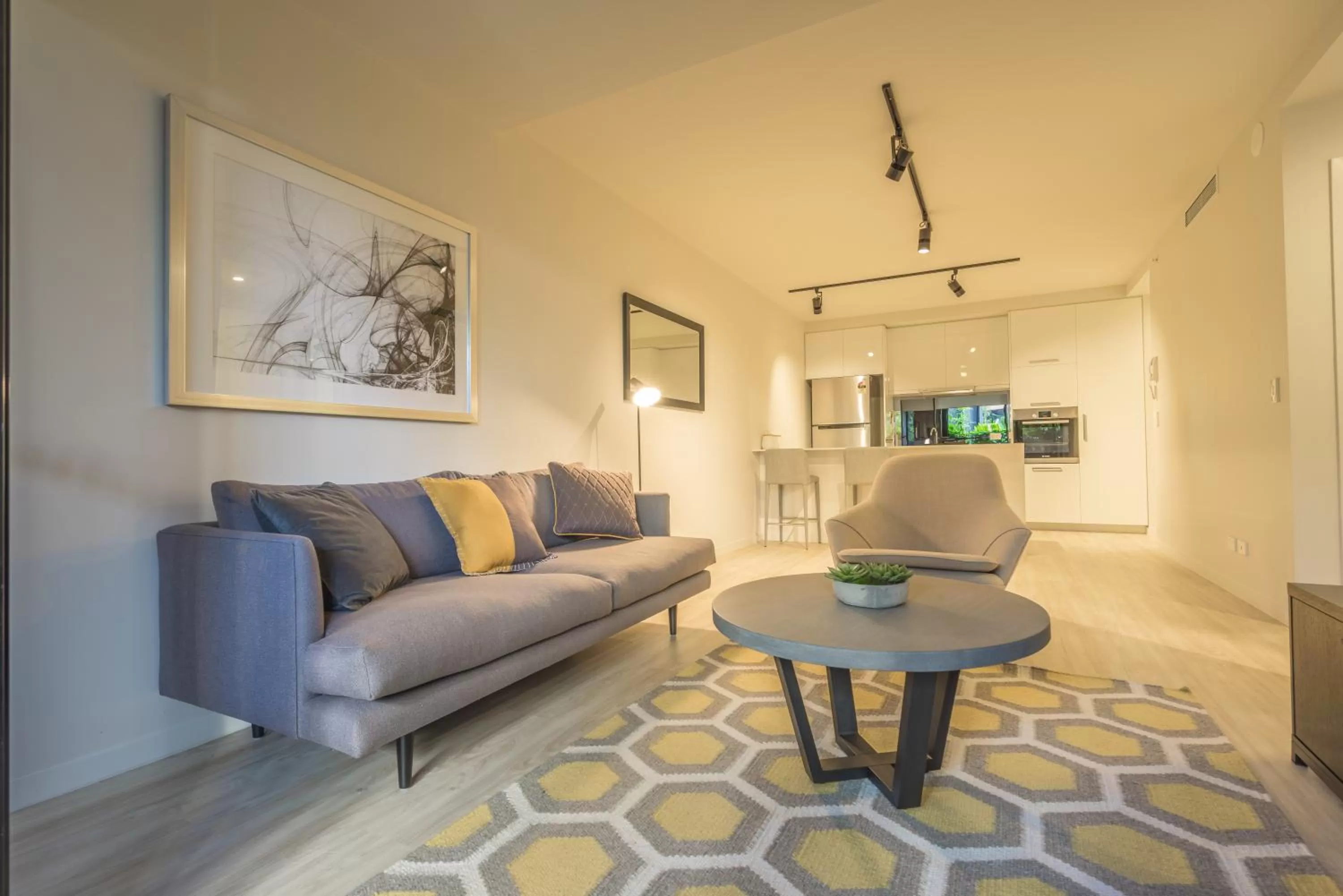 Living room in Arena Apartments by CLLIX