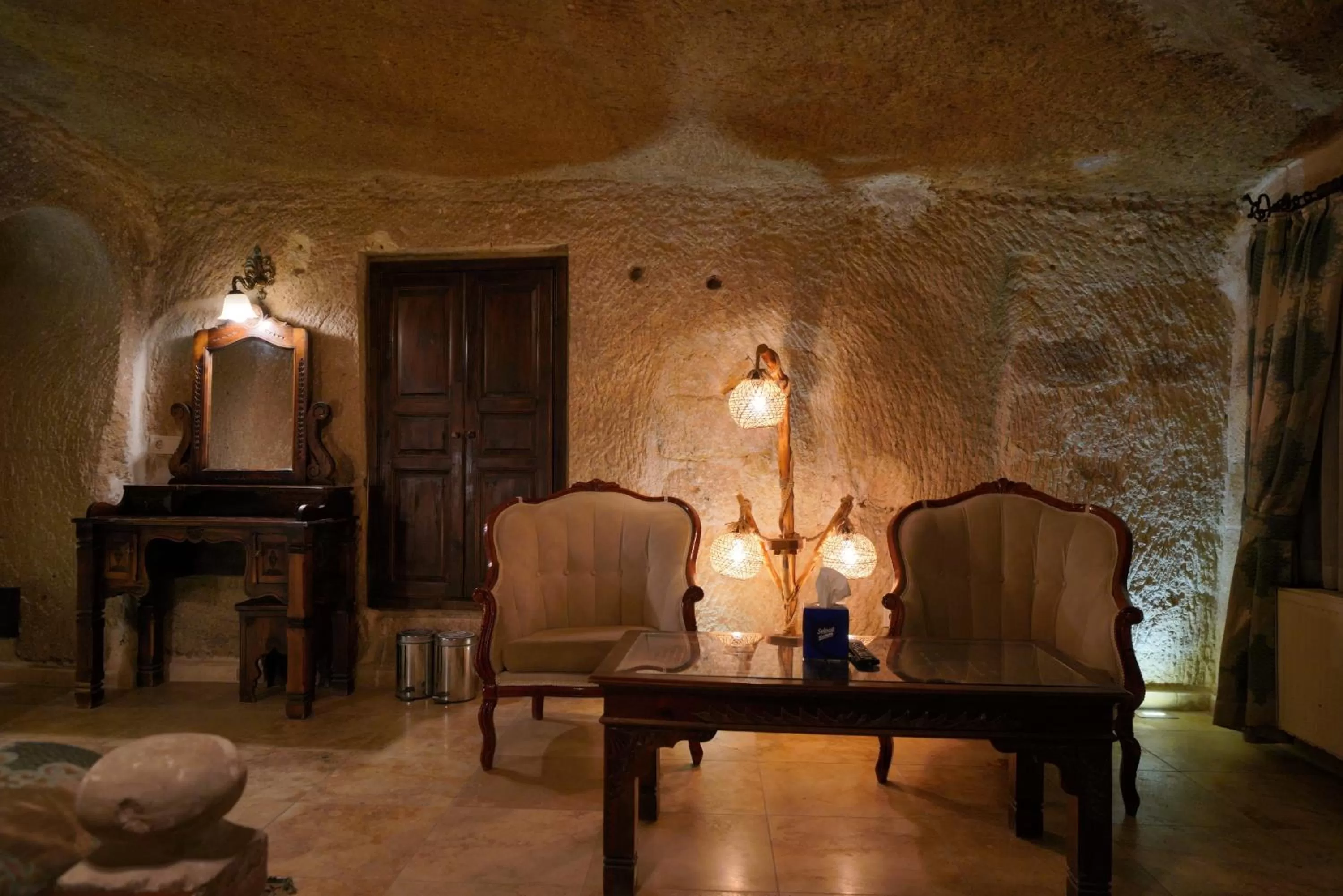 Living room in Shoestring Cave House