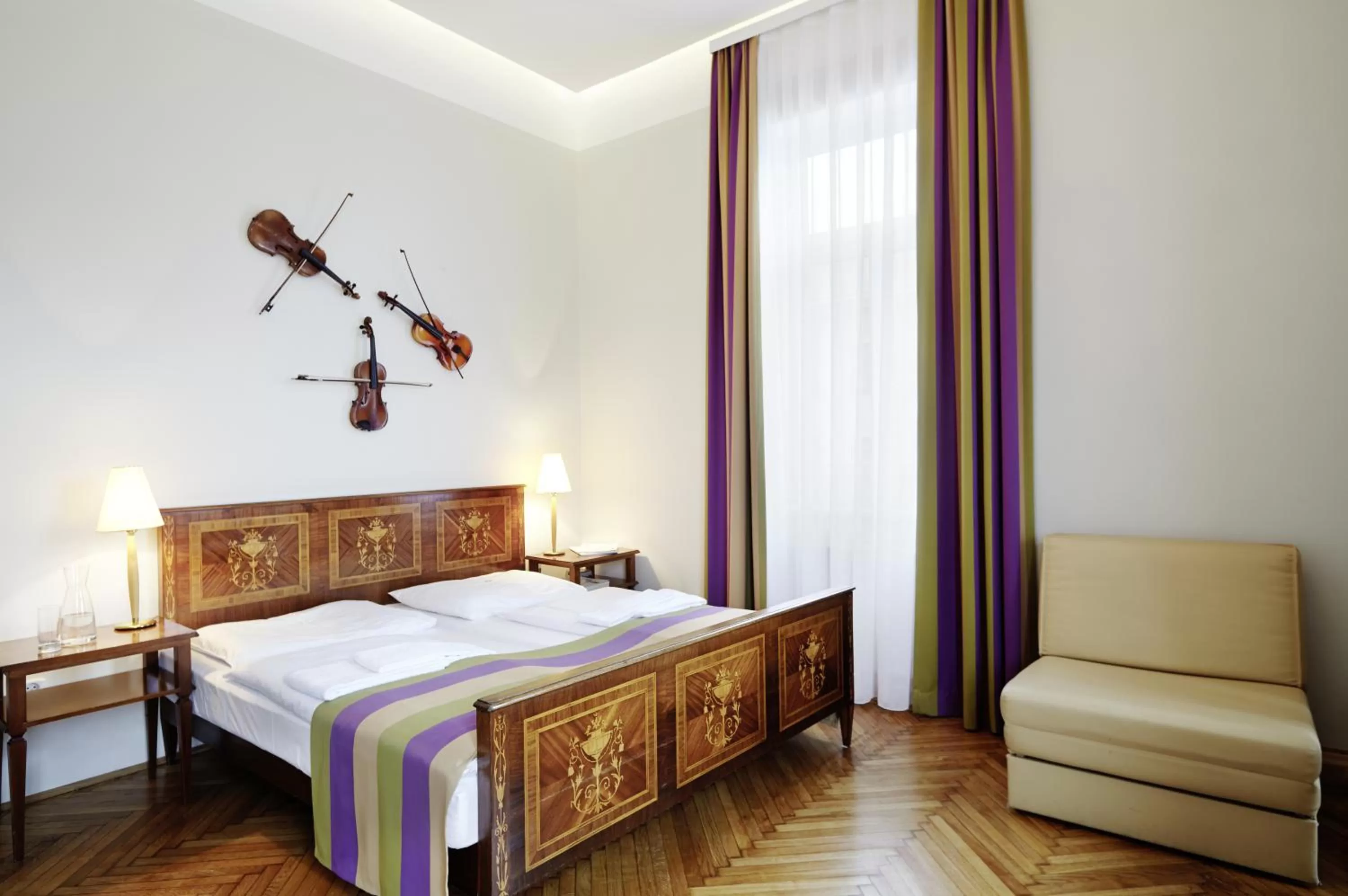 Photo of the whole room, Bed in BoutiqueHOTEL Donauwalzer