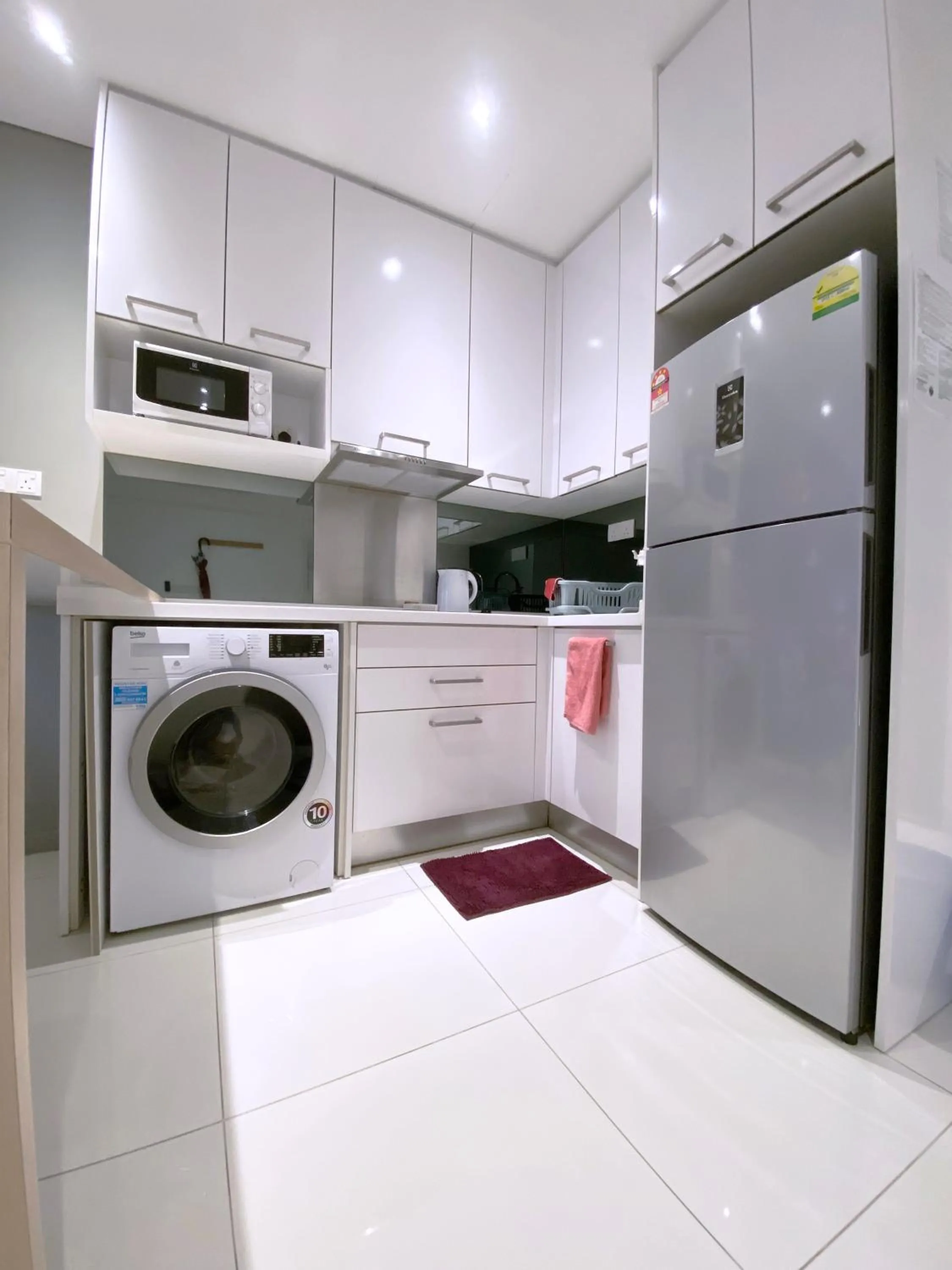 Kitchen/Kitchenette in Mercu Summer Suite KLCC @ Penguin Homes