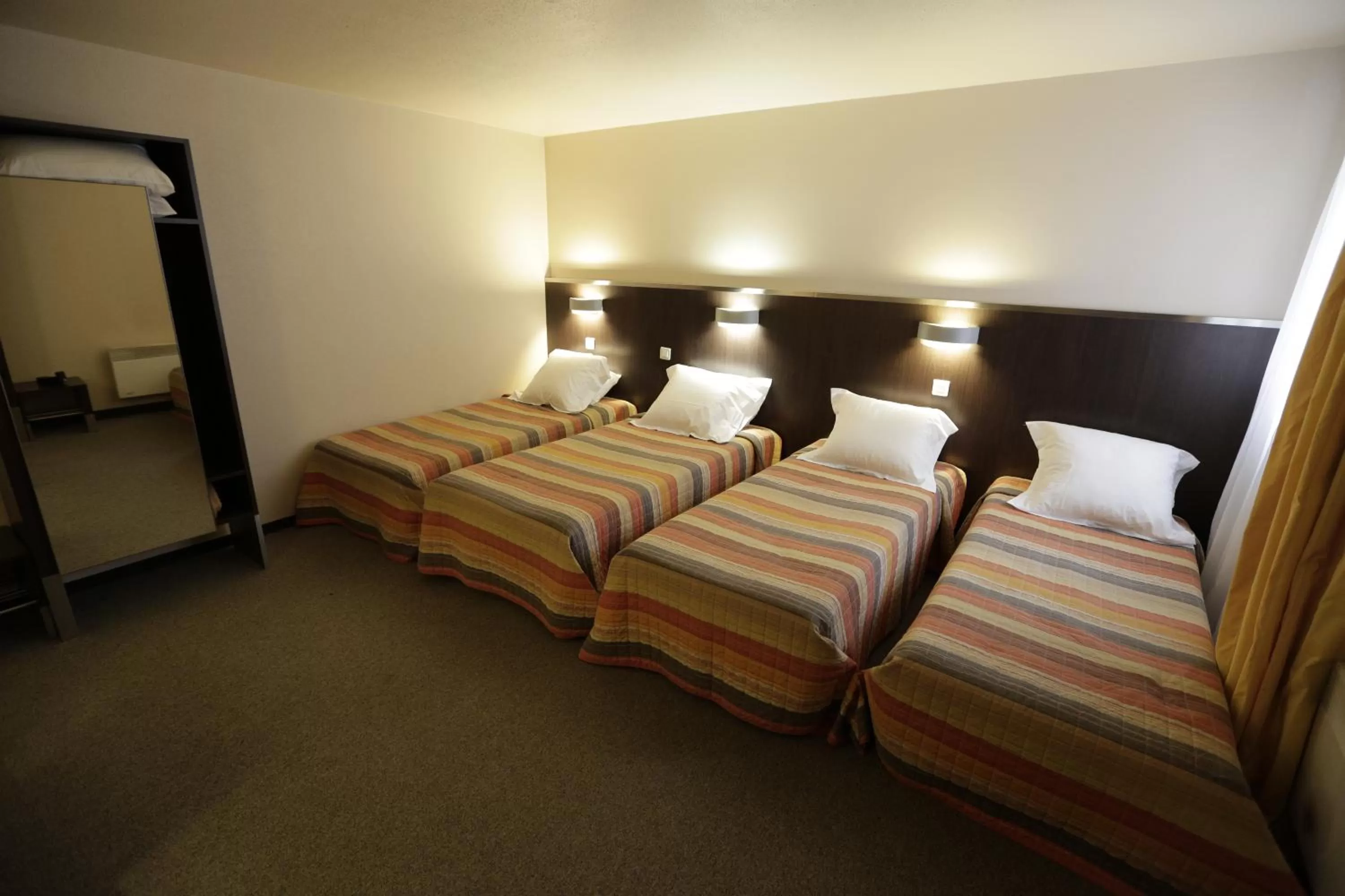 Bedroom, Bed in Hôtel Au Petit Caporal