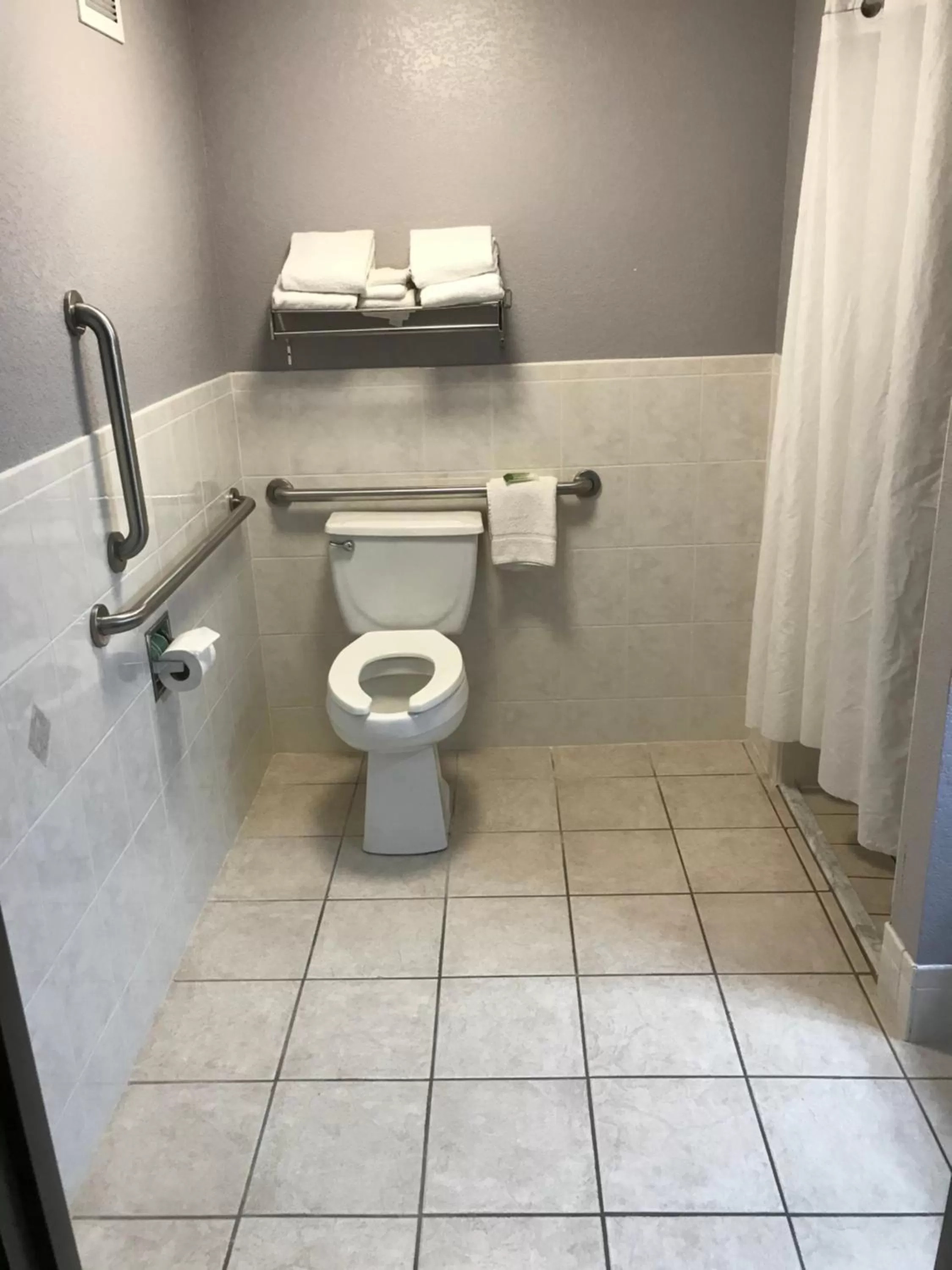 Bathroom in AmericInn by Wyndham Ankeny/Des Moines