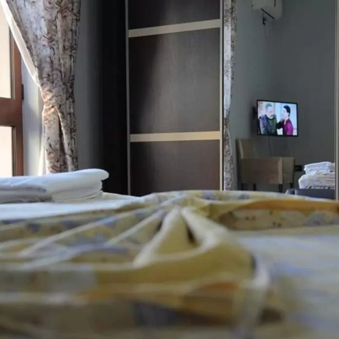 Bed in Hotel Ambasador