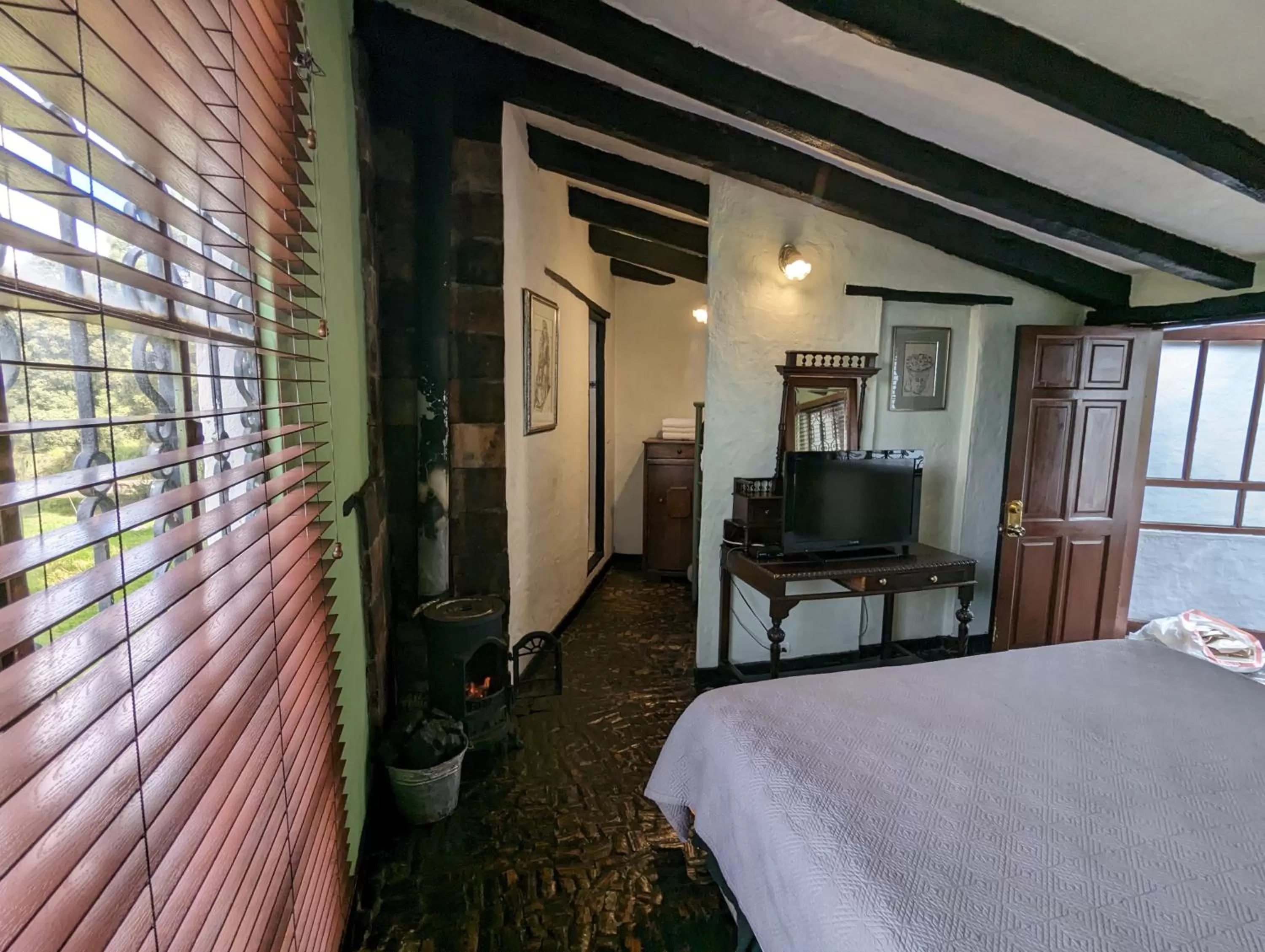 flat iron, Bed in Posada Cafe La Huerta