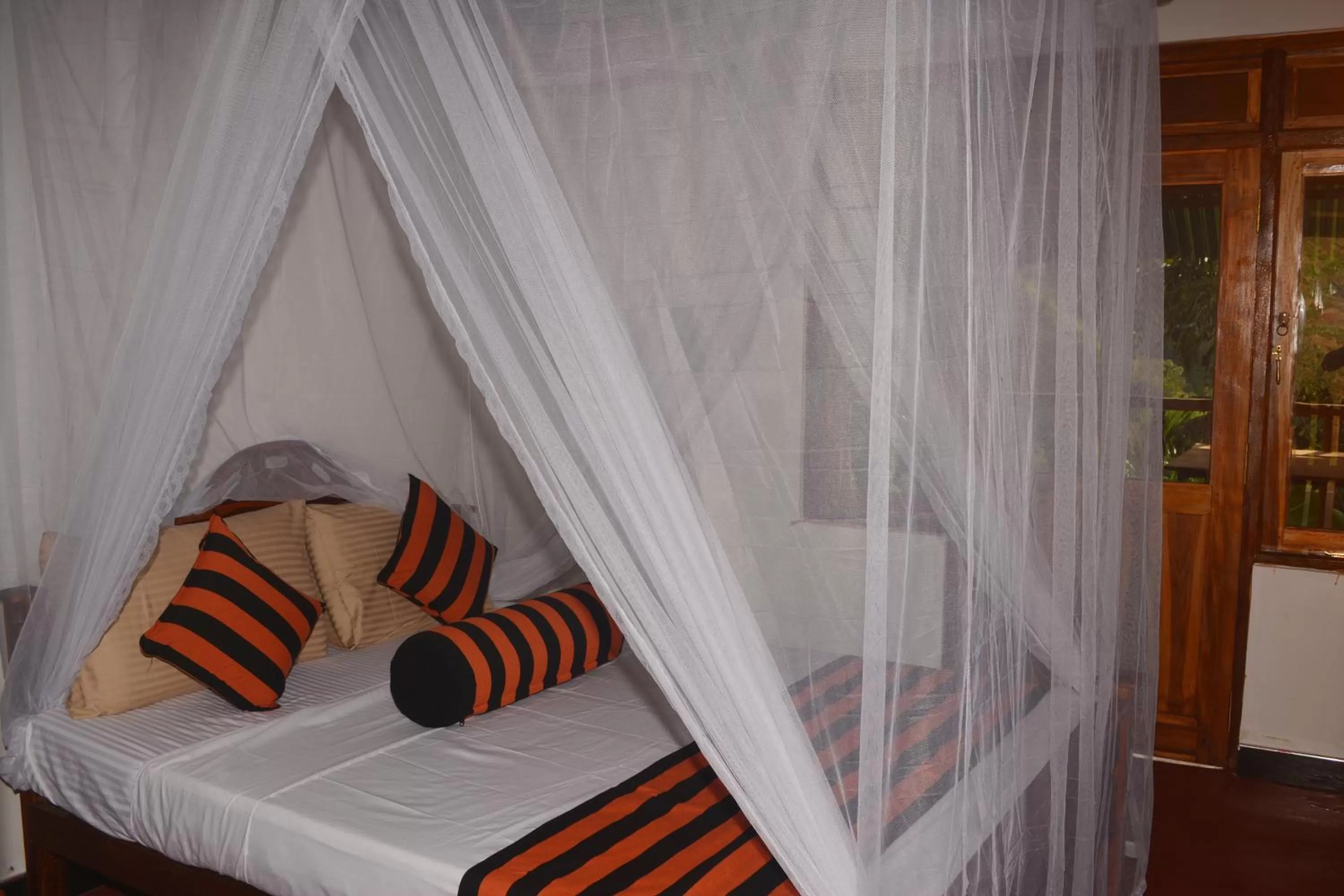 Bed in Ella River Face Inn