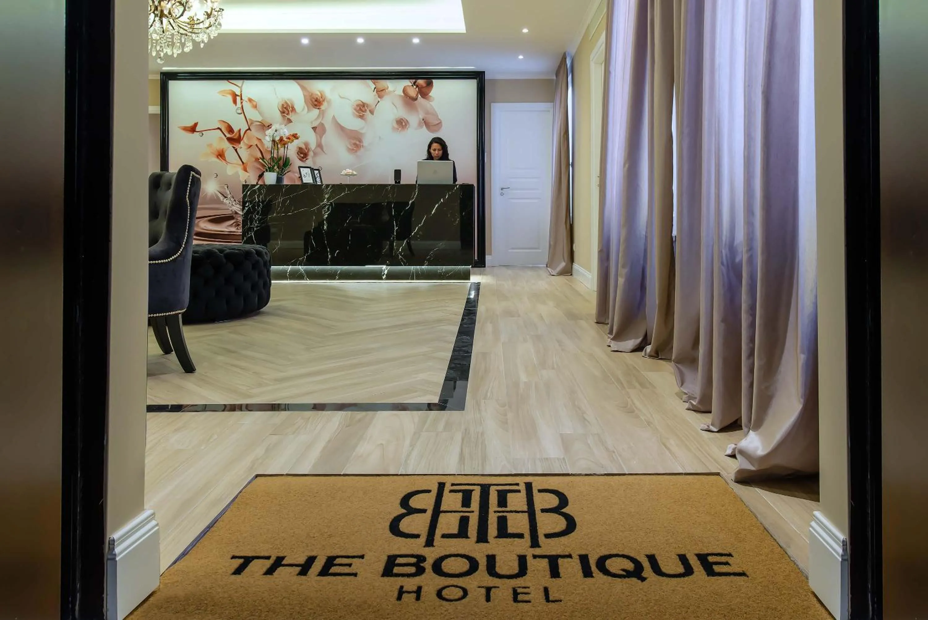 Property logo or sign in The Boutique Hotel