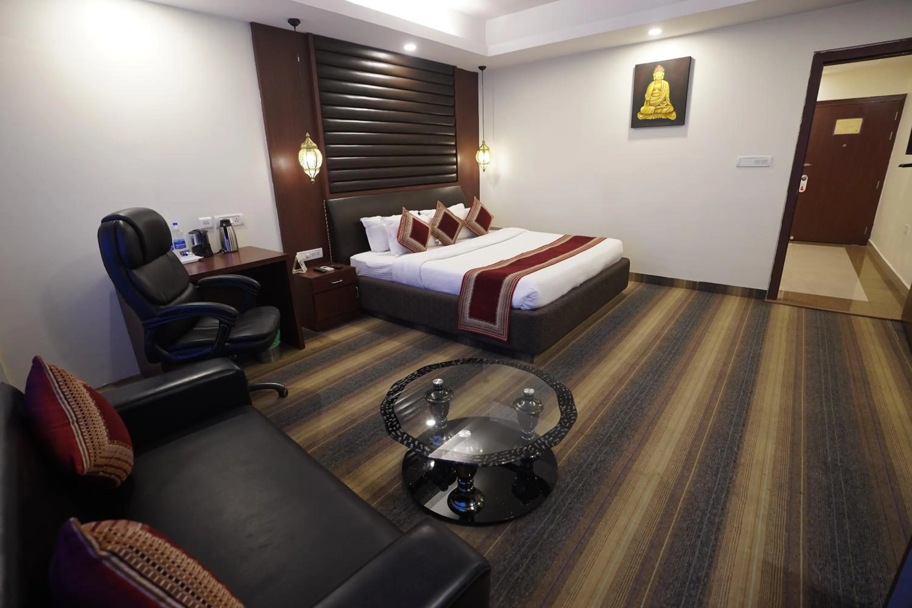 Photo of the whole room, Bed in HOTEL AVN GRAND