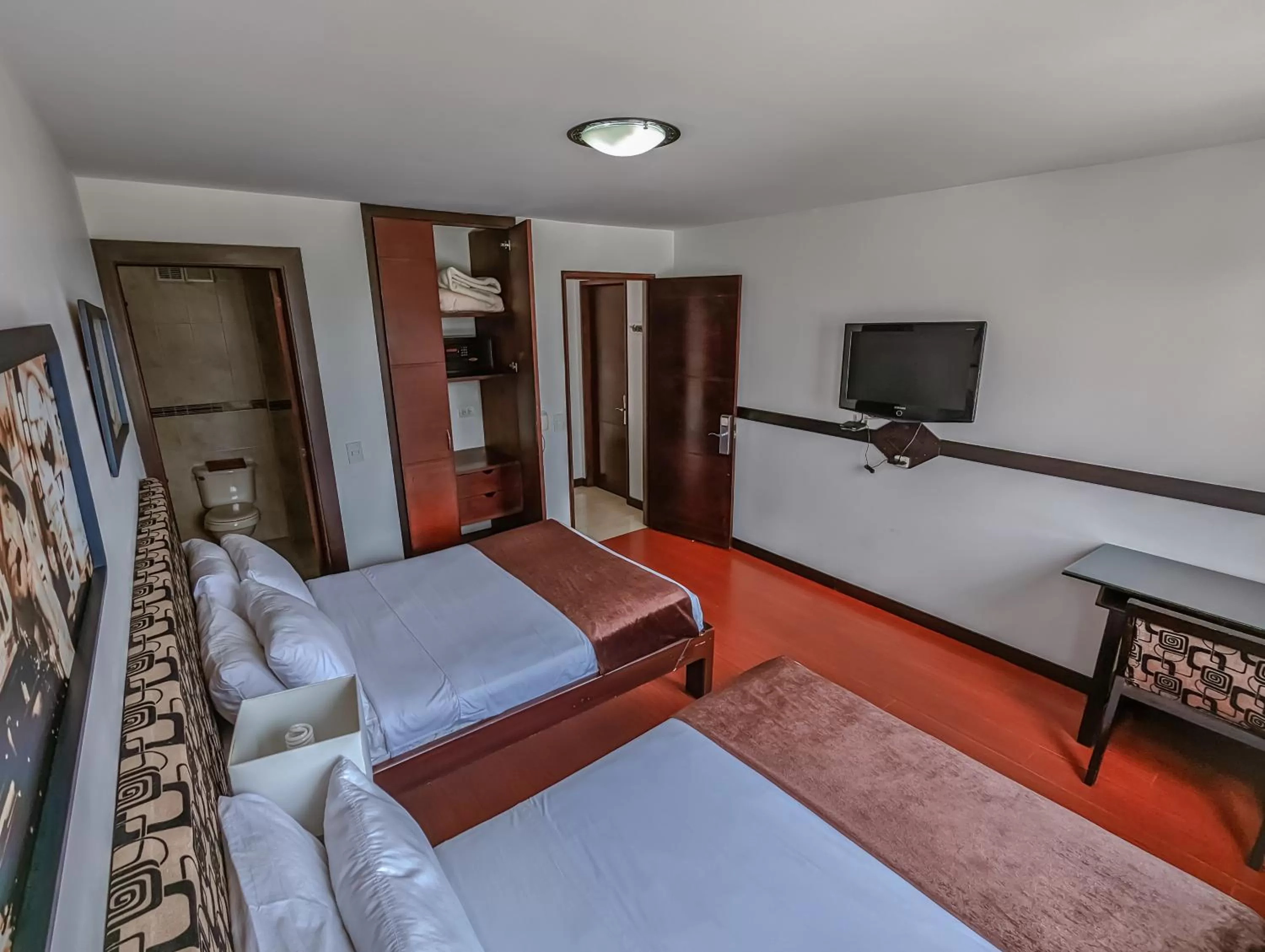 Bed in Hotel Charlotte Suite 26