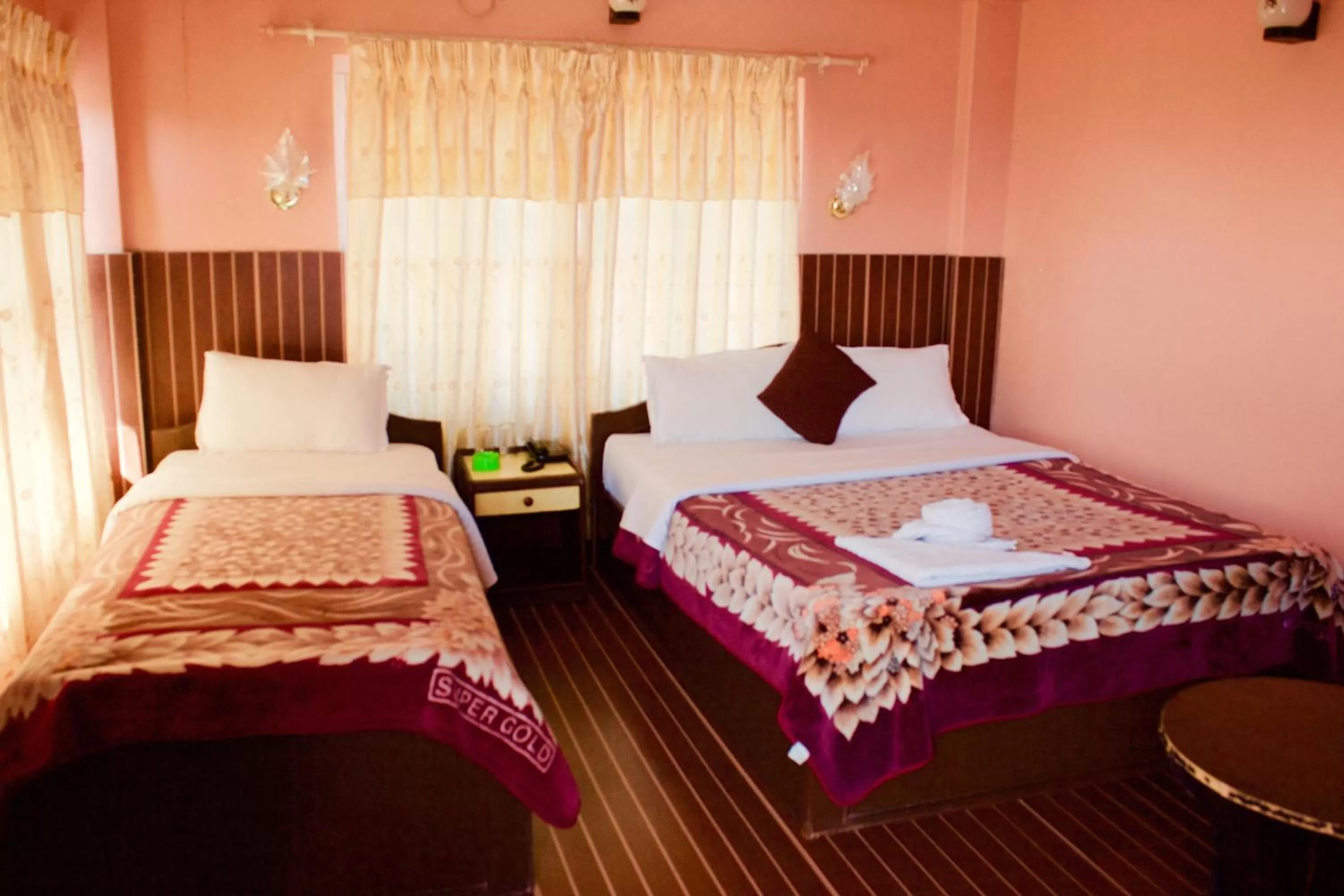 Bed in Hotel Himalayan Inn