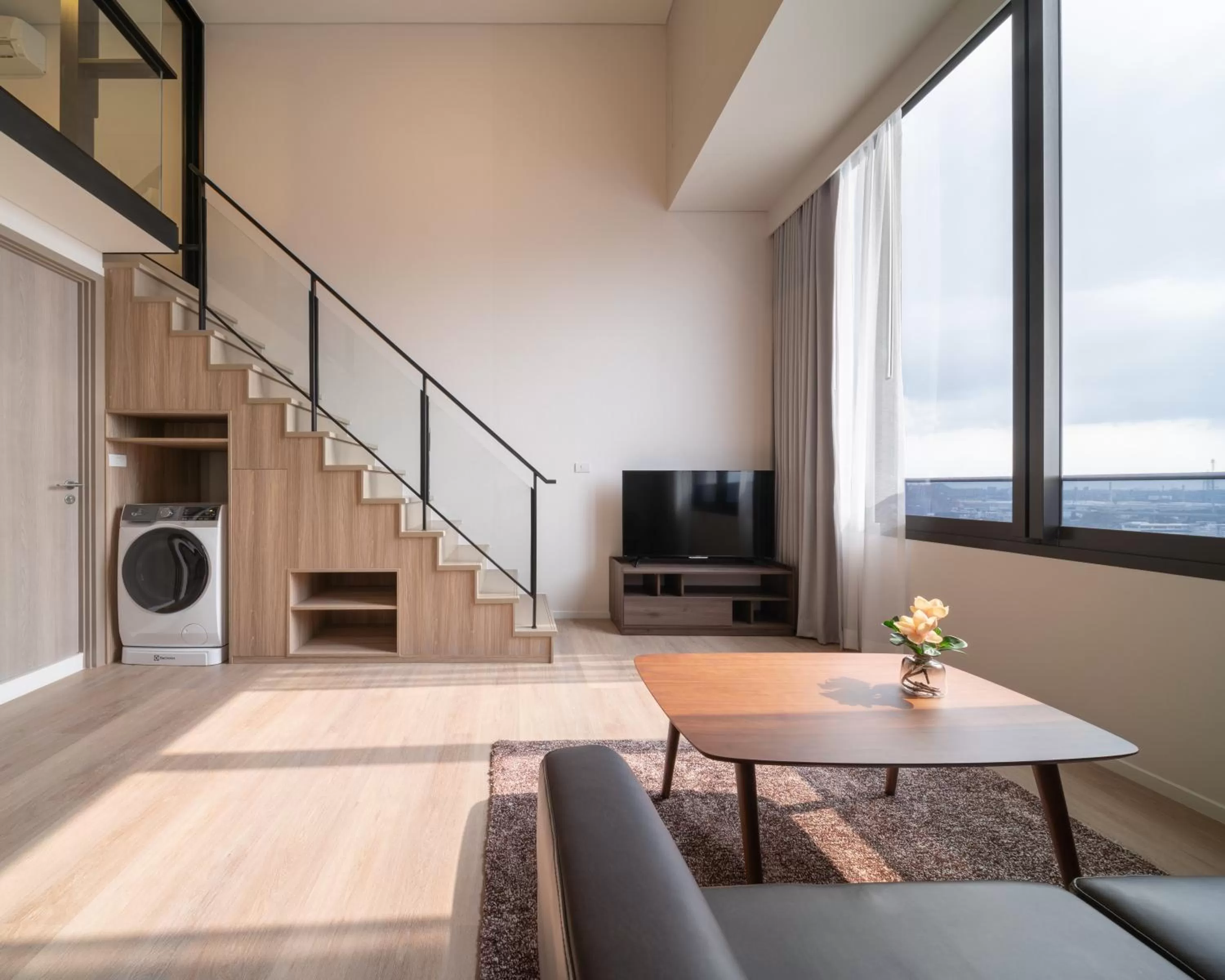 Communal lounge/ TV room in Ramada By Wyndham Bangkok Sukhumvit 87