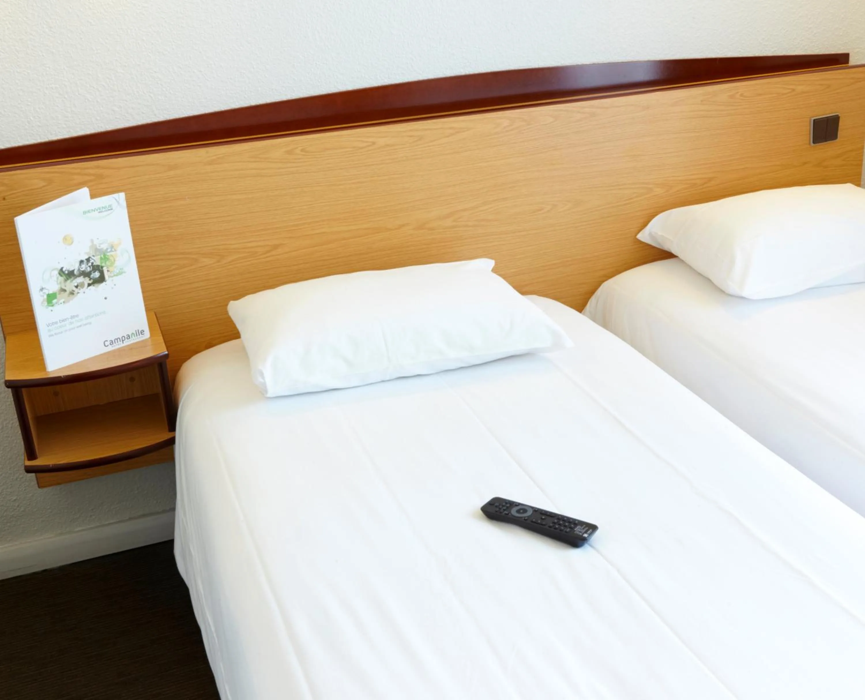 Bed in Kyriad Direct Le Bourget Gonesse