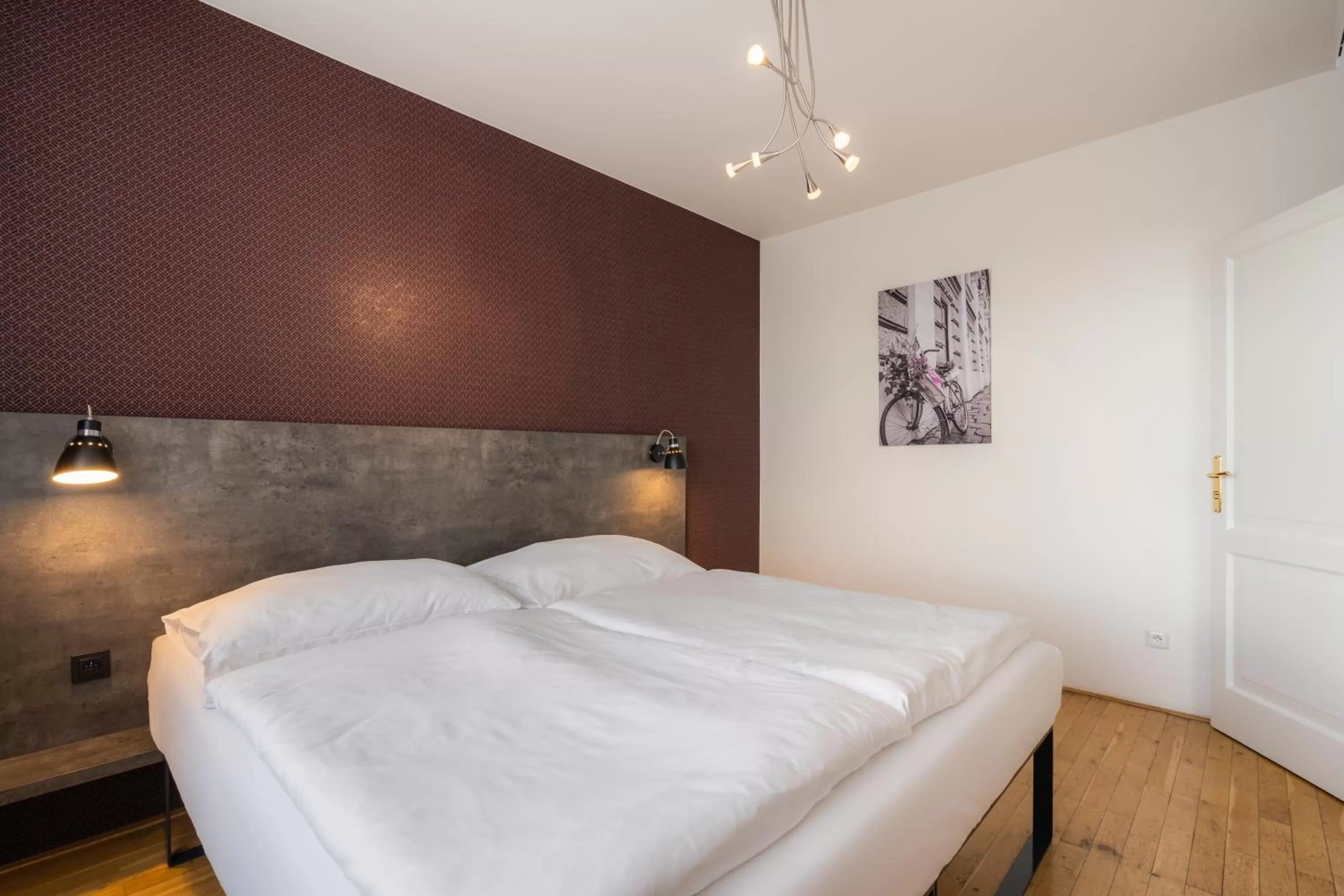 Bed in EA ApartHotel Melantrich