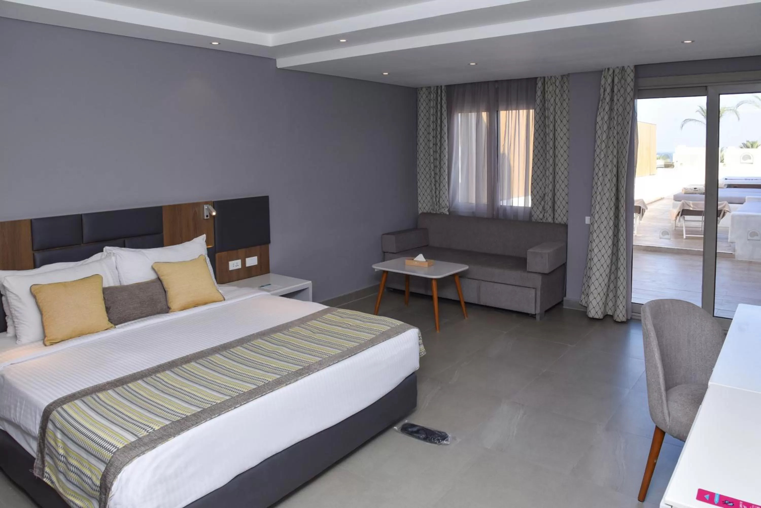 Bedroom, Bed in Sunrise Diamond Beach Resort -Grand Select