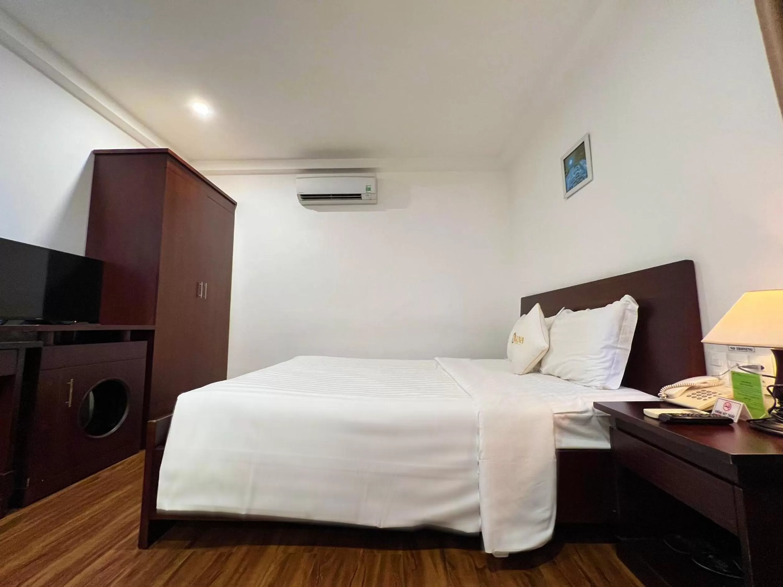 Bed in ALUNA Ben Thanh Hotel