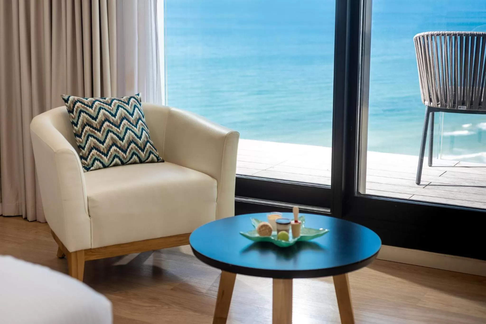 Seating area in Vert Lagoon Netanya By AFI Hotels