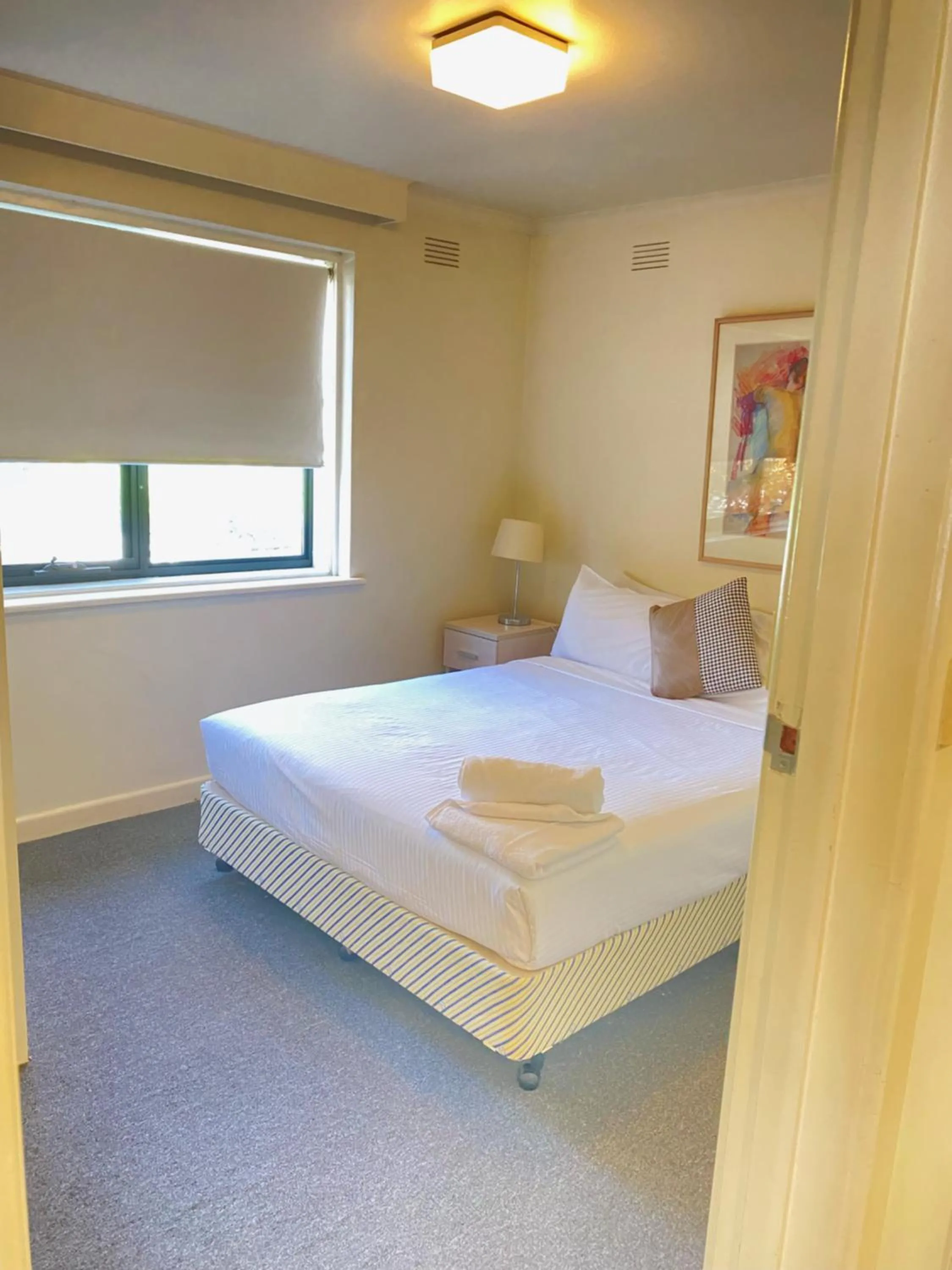 Bedroom, Bed in City Edge East Melbourne Apartment Hotel