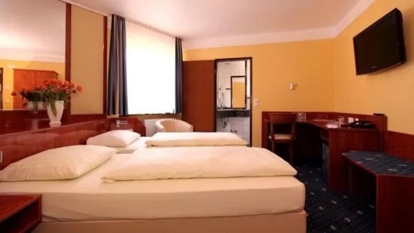 Photo of the whole room, Bed in Aparthotel Astro - Nichtraucherhotel