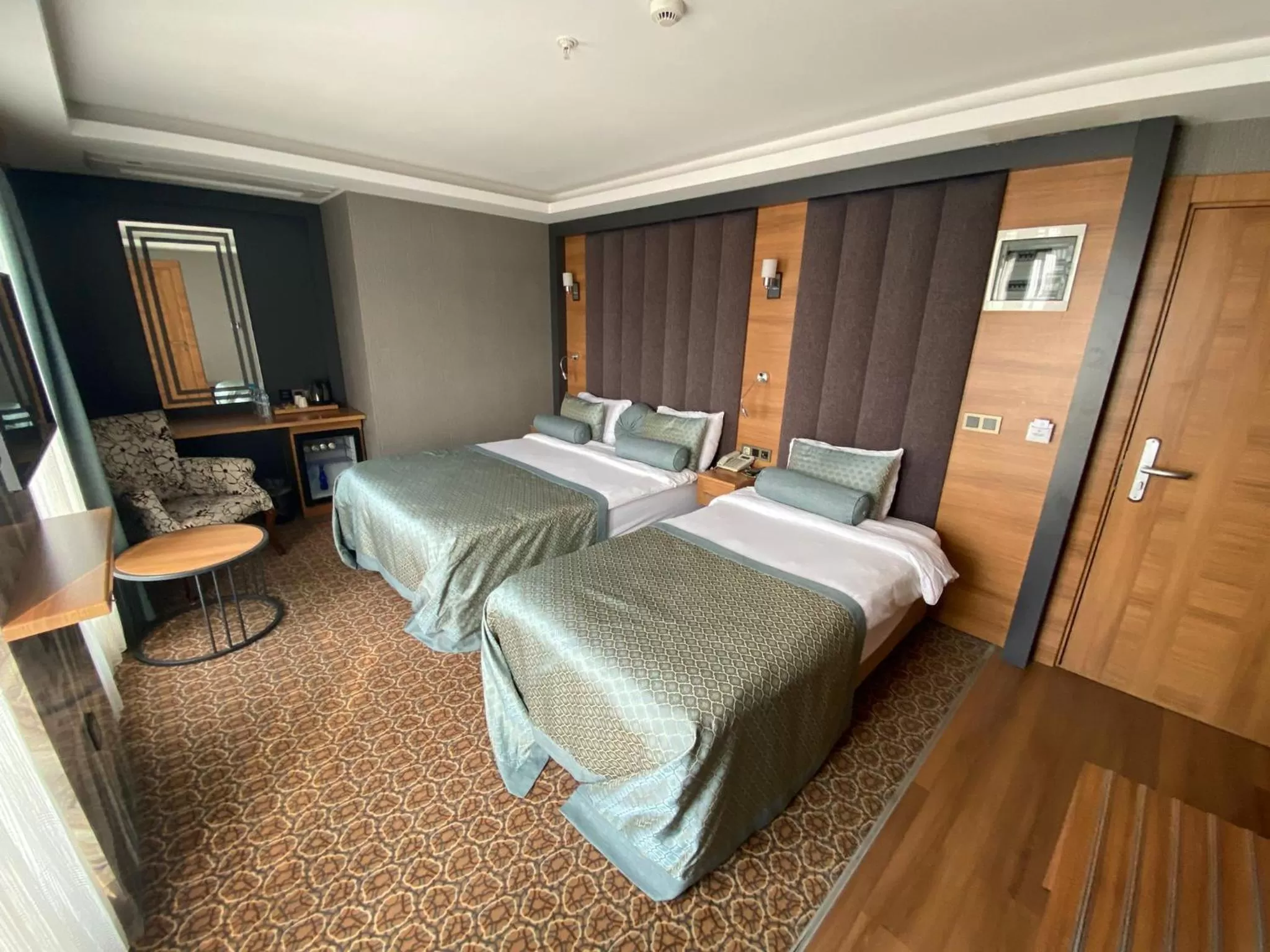 Bed in Green Prusa Hotel