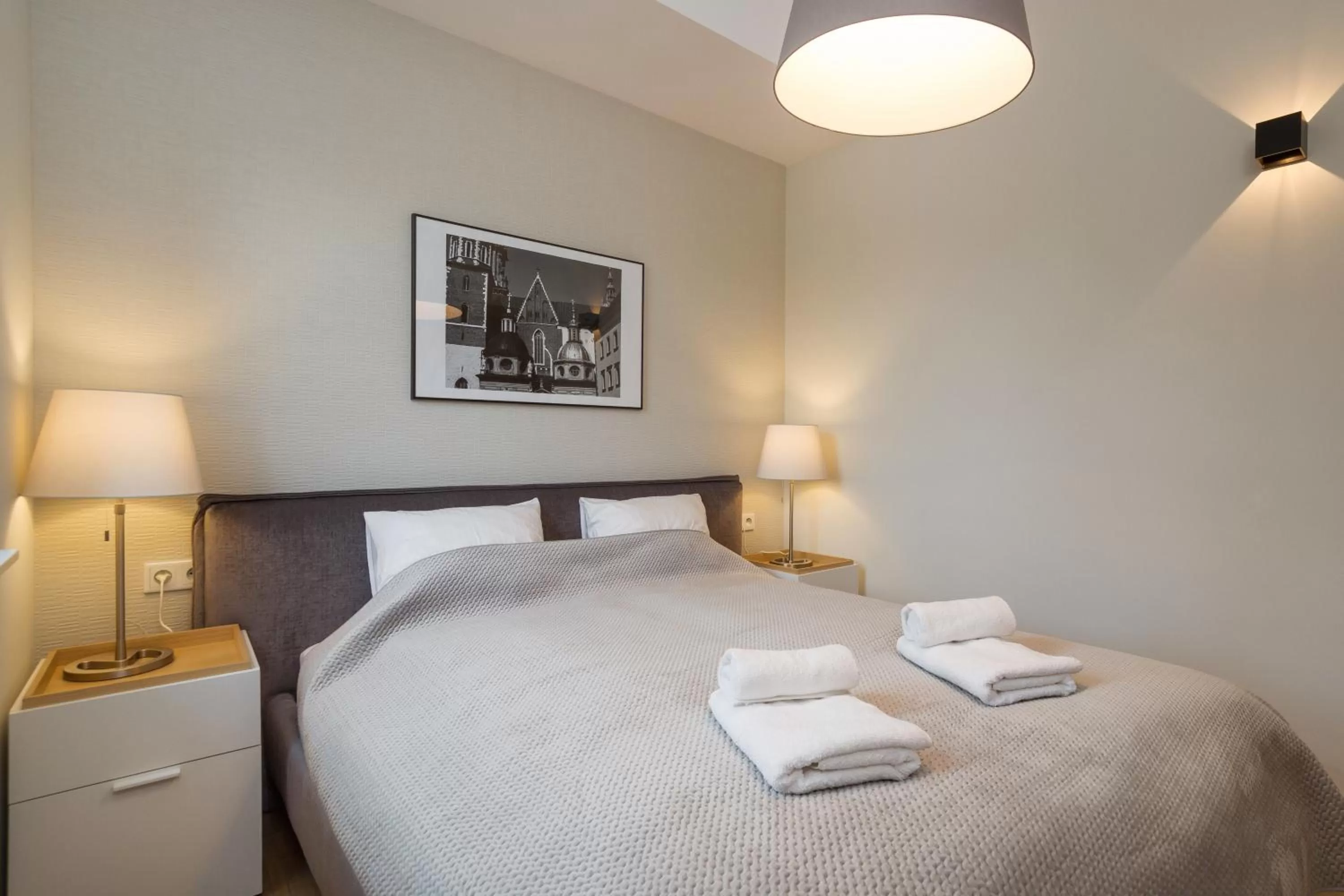 Bed in Riverside Aparthotel Cracow