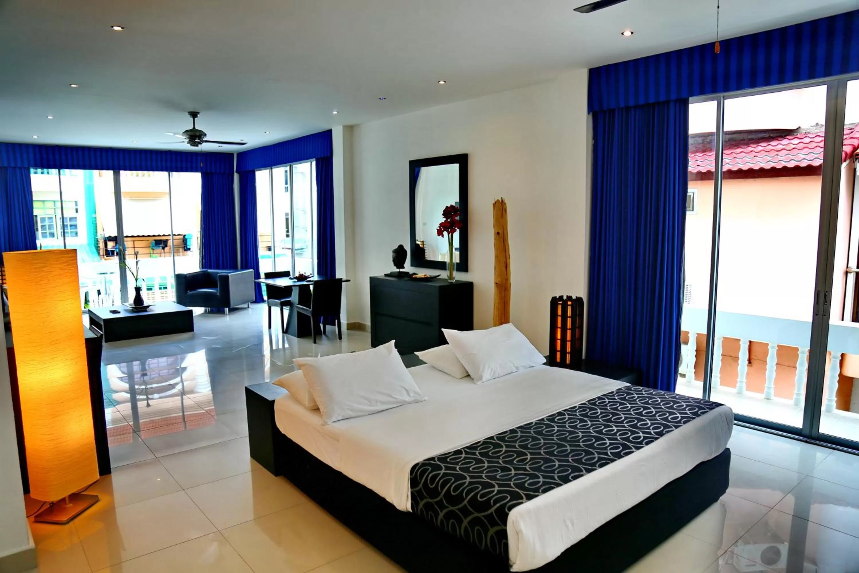 Photo of the whole room, Bed in East Suites