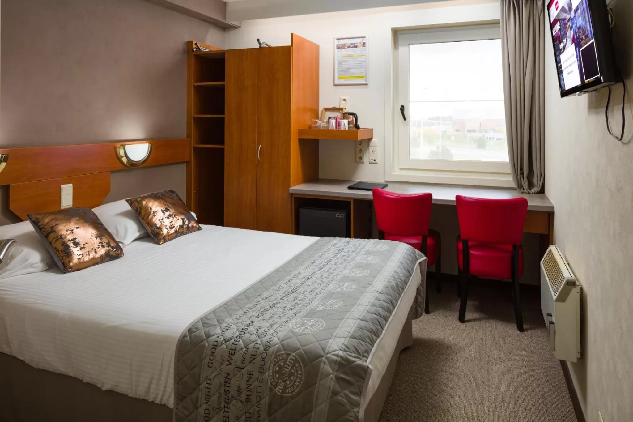 Bed in Vivaldi Hotel