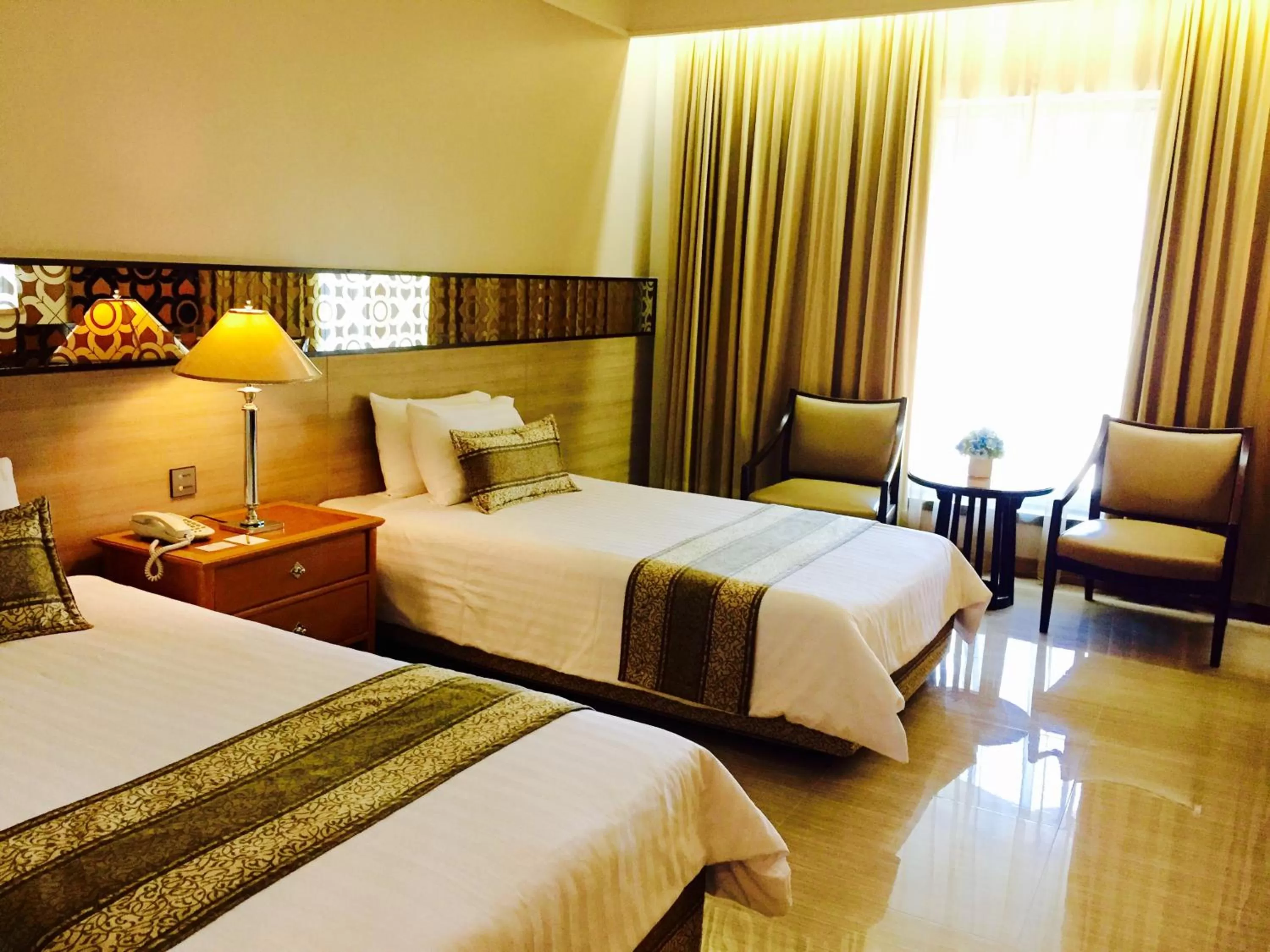 Photo of the whole room, Bed in Indra Regent Hotel