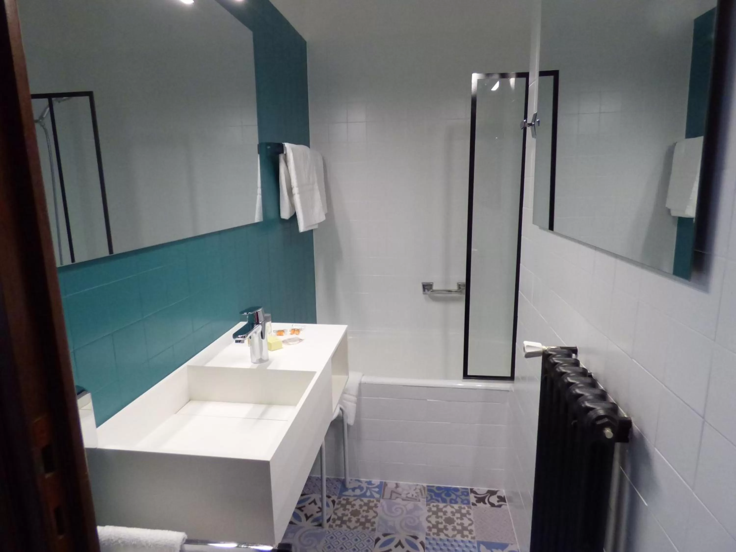 Bathroom in Cit'Hotel L'Etape