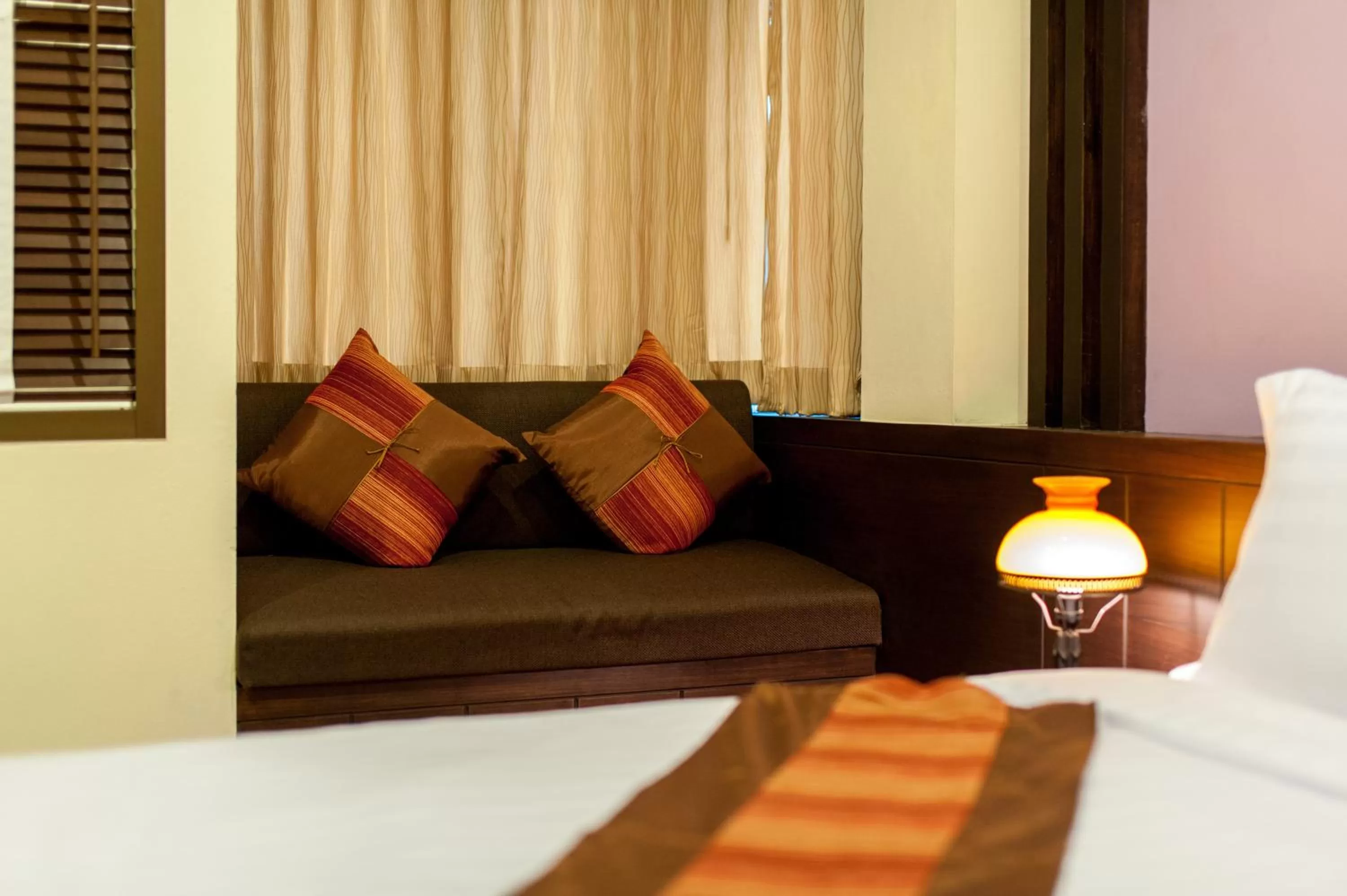 Decorative detail, Bed in Tara Place Hotel Bangkok