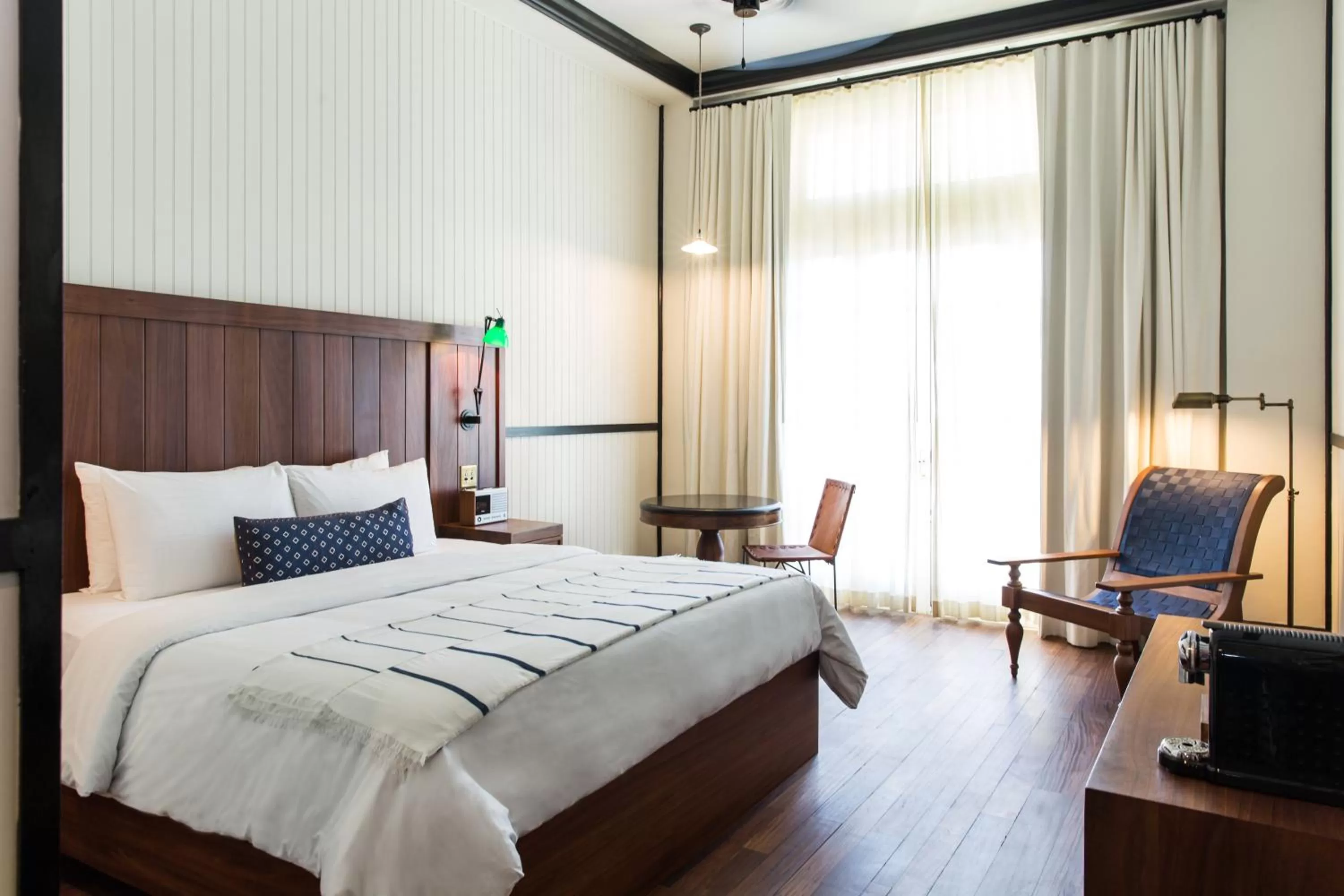 Bed in American Trade Hotel