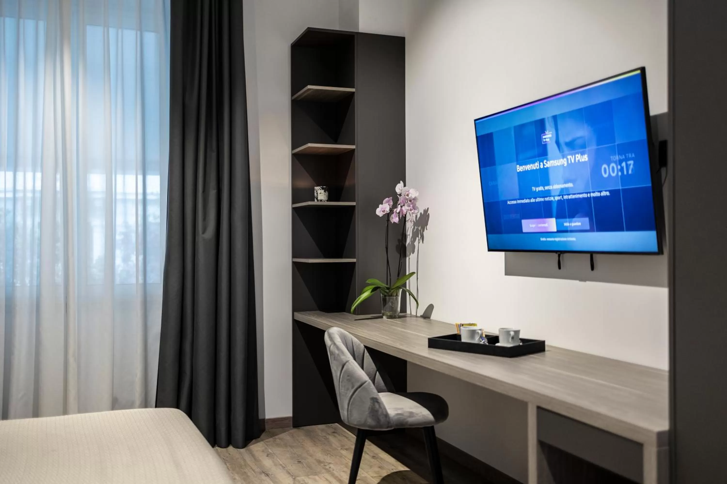 TV and multimedia, TV/Entertainment Center in Corso 84 Luxury Suites