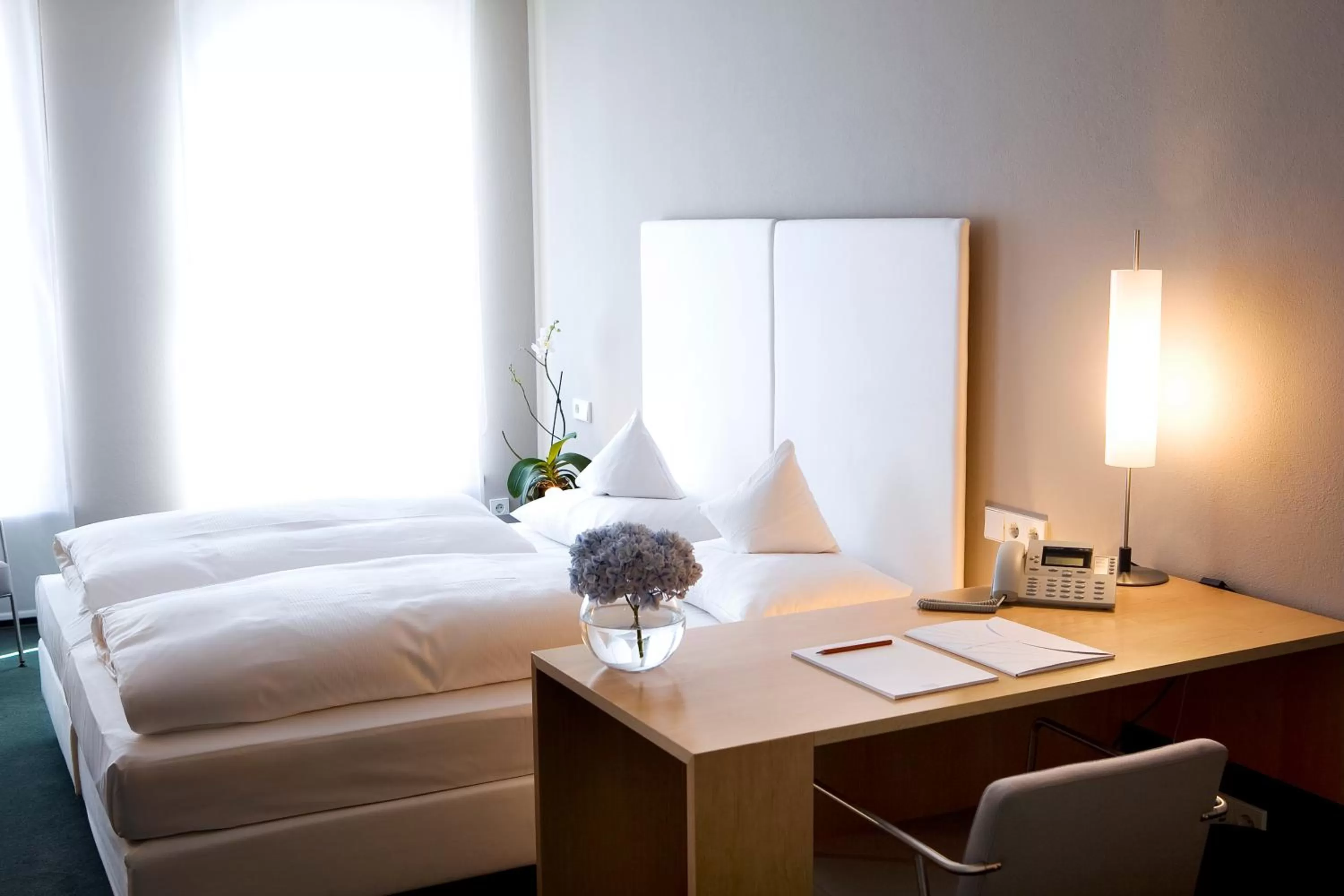 Bed in Hotel an der Stadtmauer