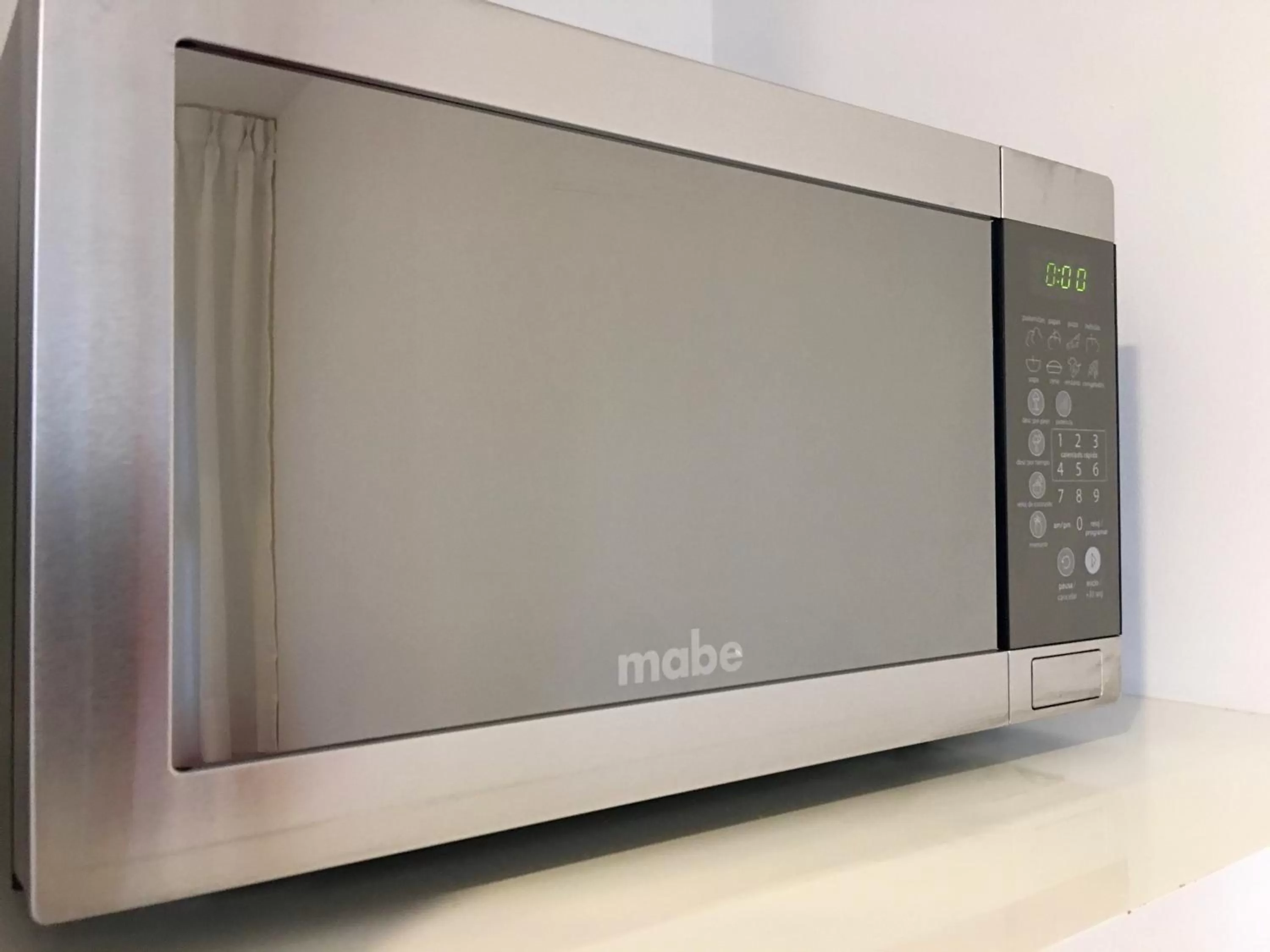 Kitchen or kitchenette in Herbal Inn Suites