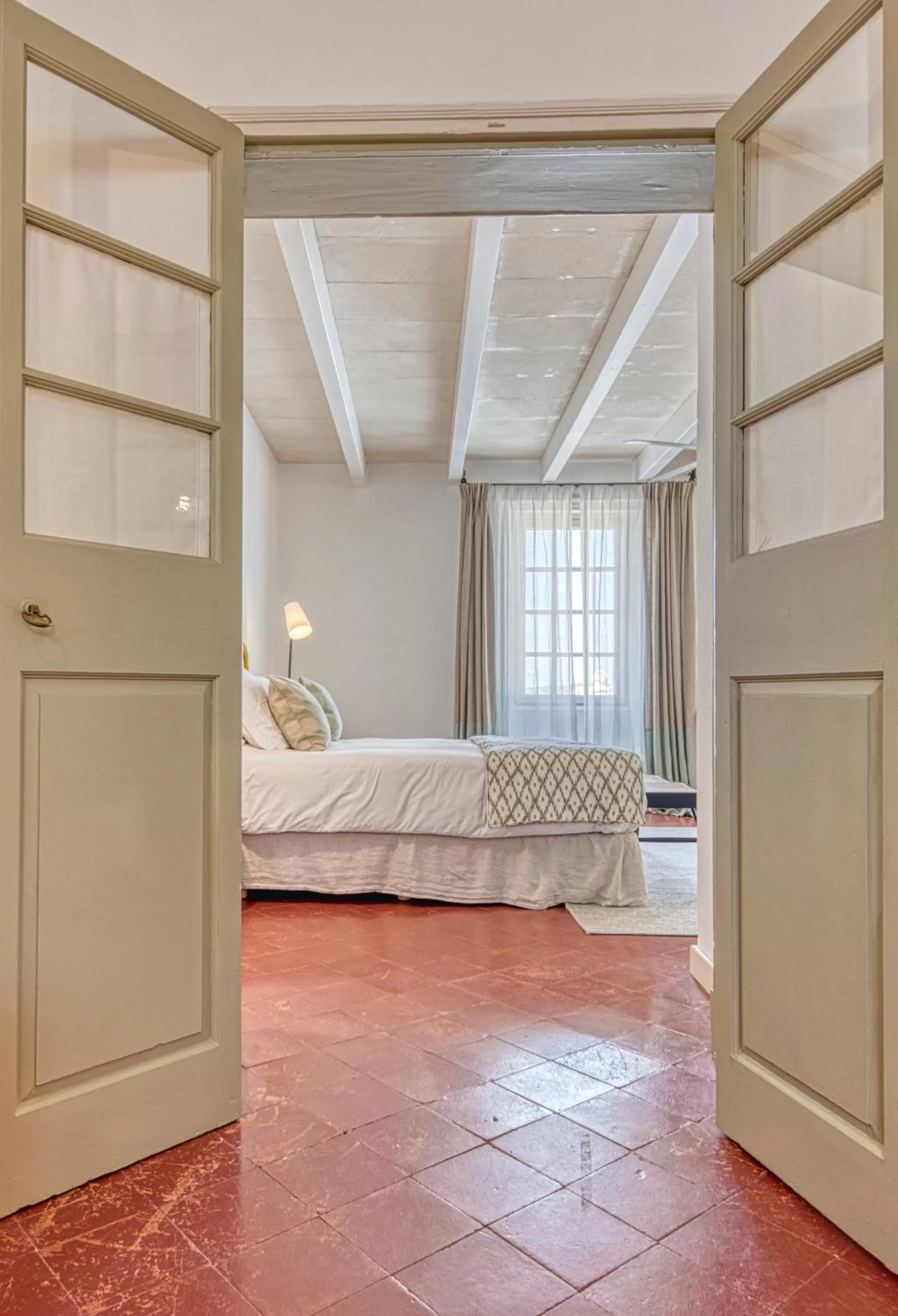 Decorative detail, Bed in Can Alberti 1740 Boutique Hotel