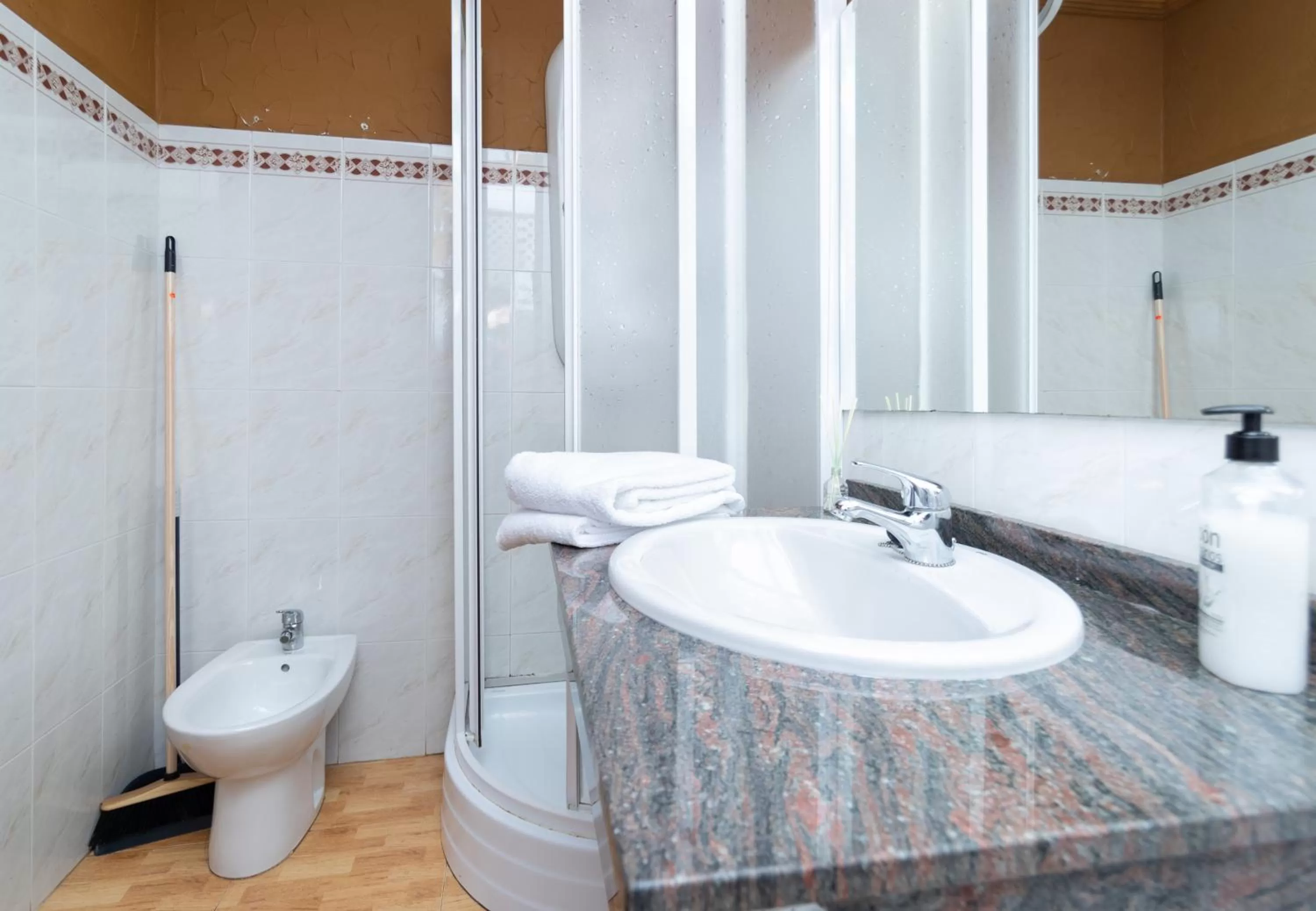 Bathroom in Unique Hotel Apartments