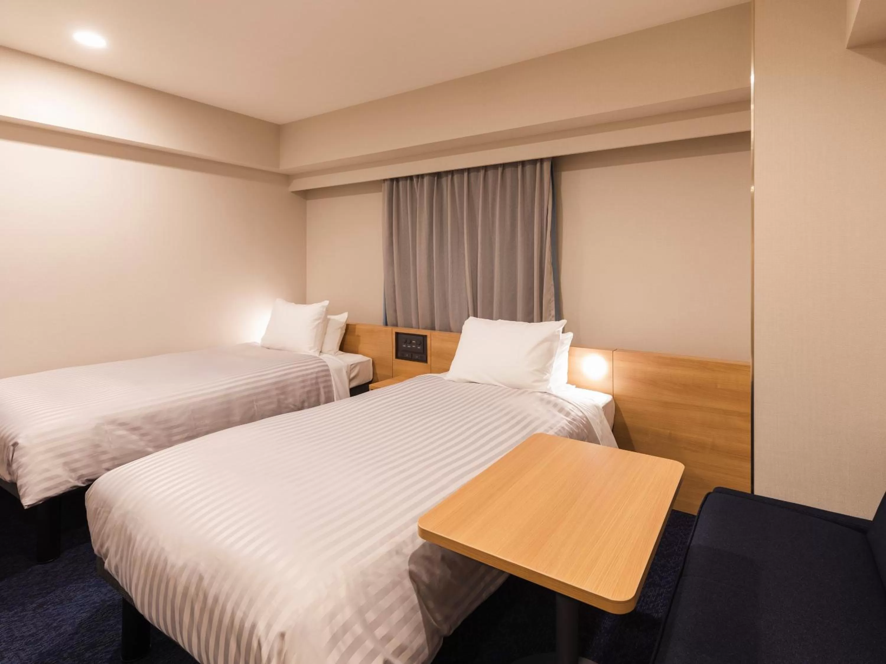 Photo of the whole room, Bed in Sotetsu Fresa Inn Nagoya-Shinkansenguchi