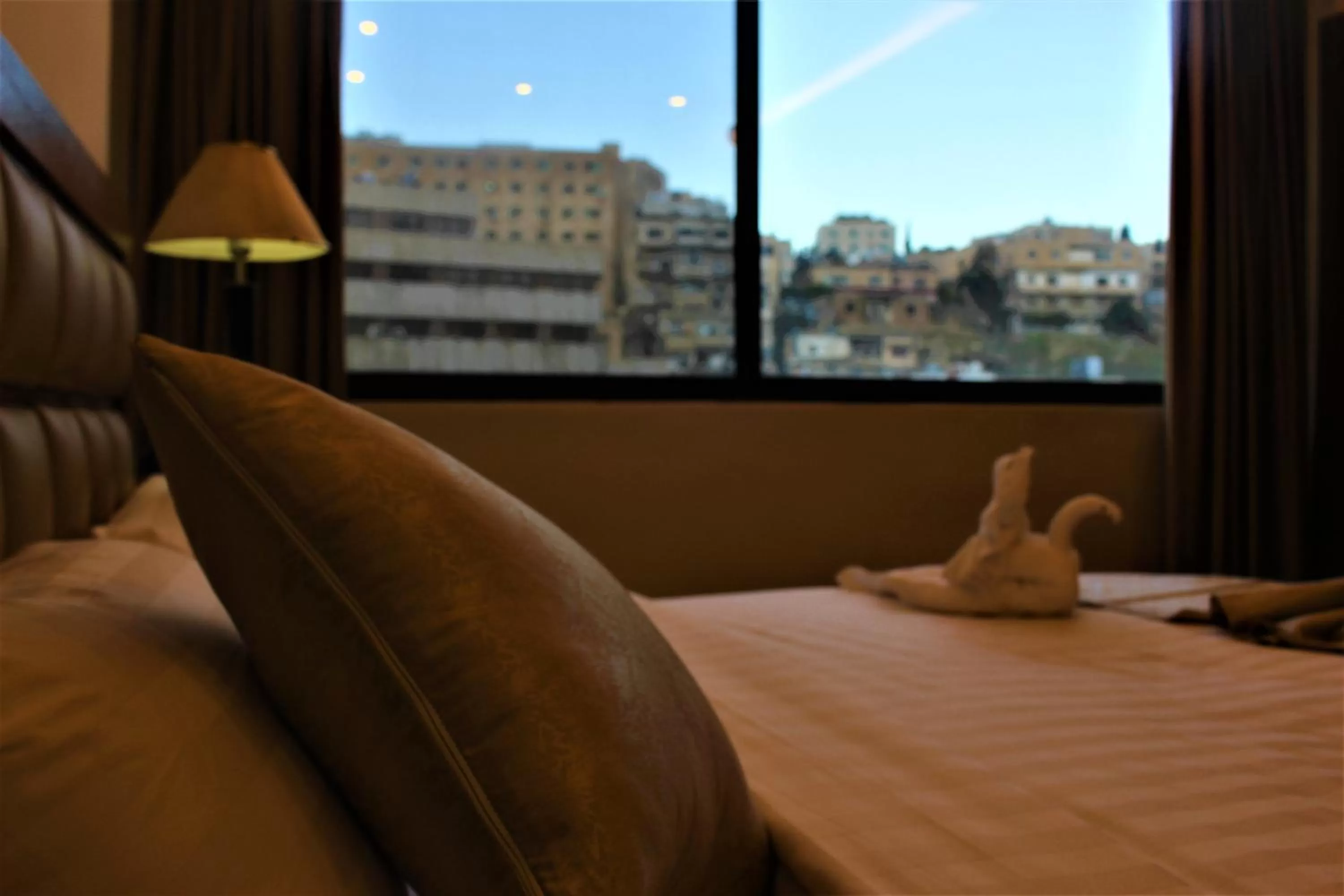 City view, Bed in New MerryLand Hotel